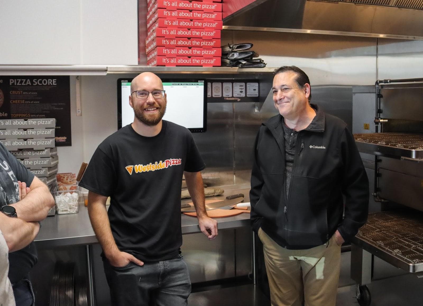 Two people standing in a Westside kitchen | Westside Pizza