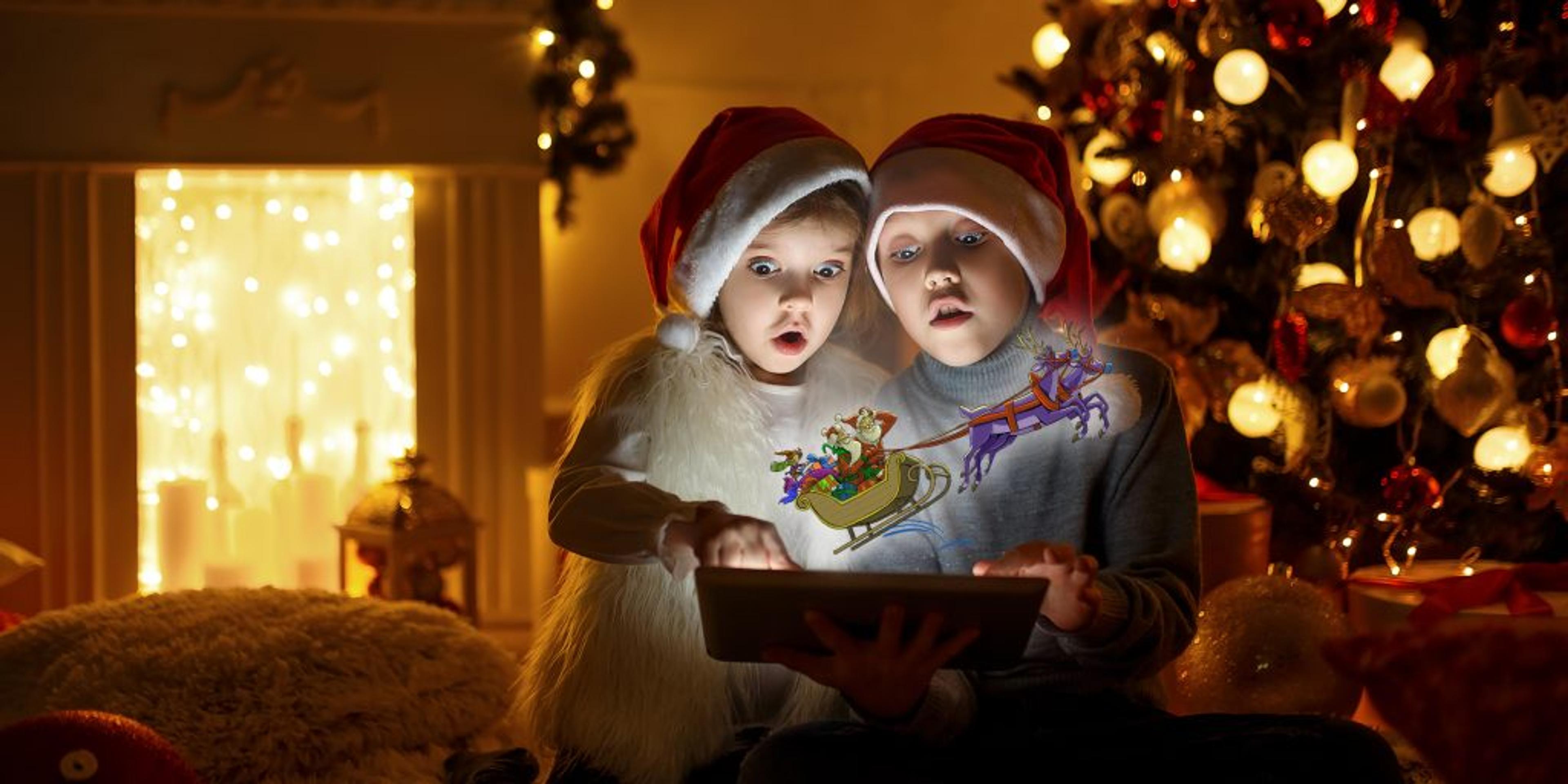 Children near a Christmas tree