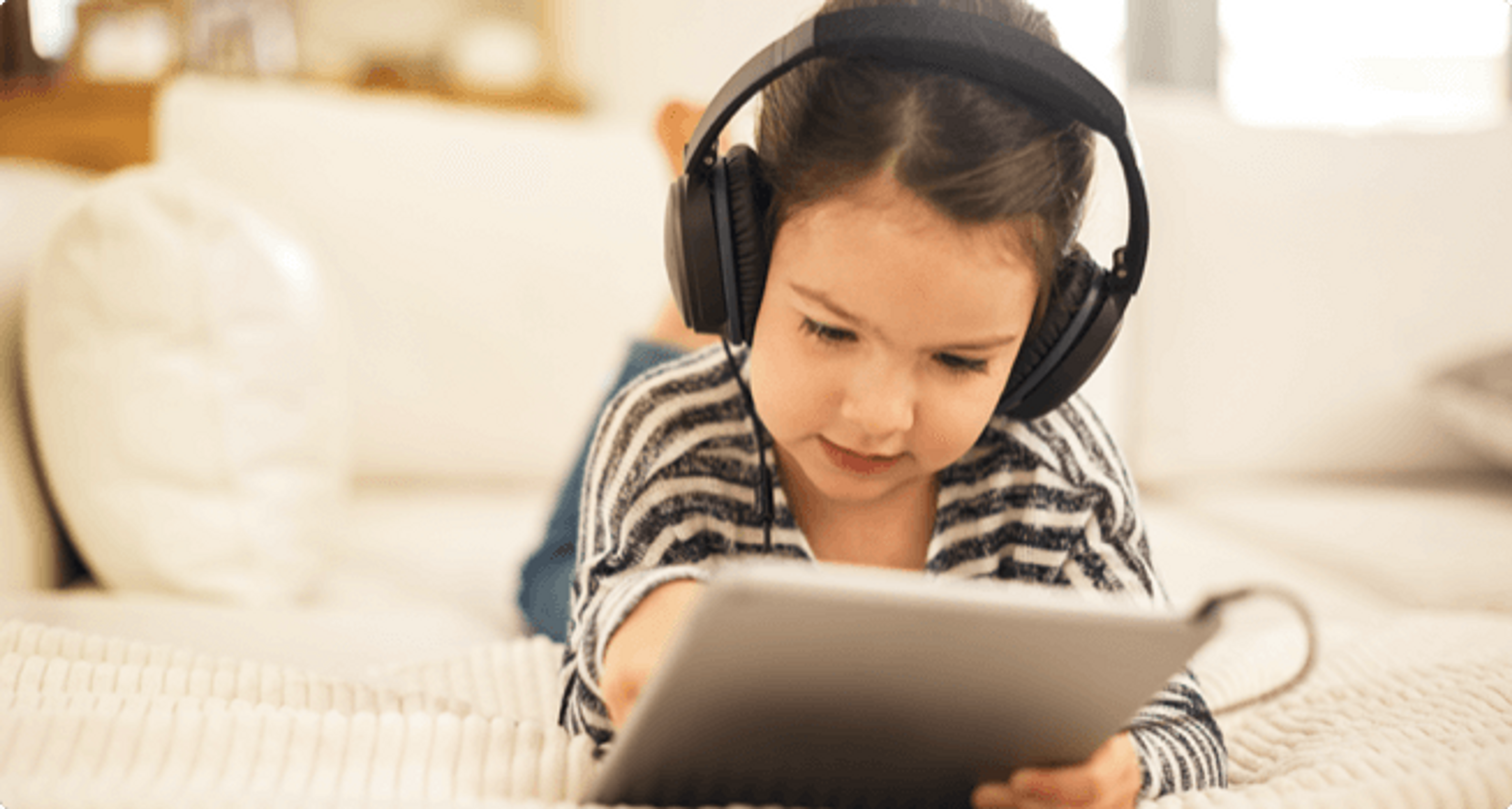 Child reading a book in the app 