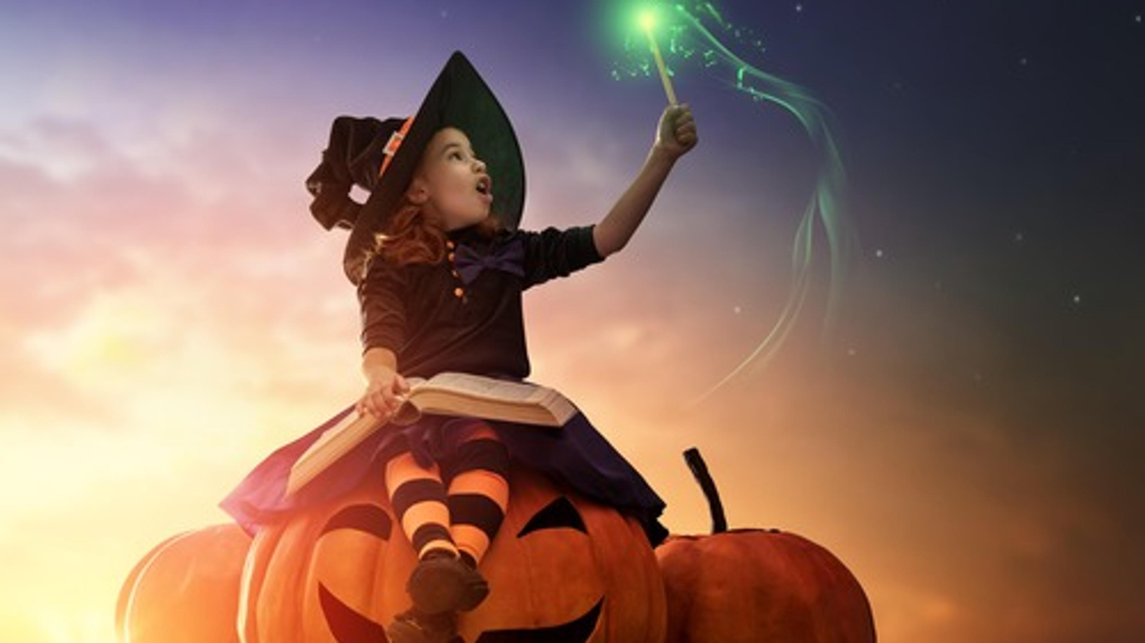 Girl on a halloween pumpkin 