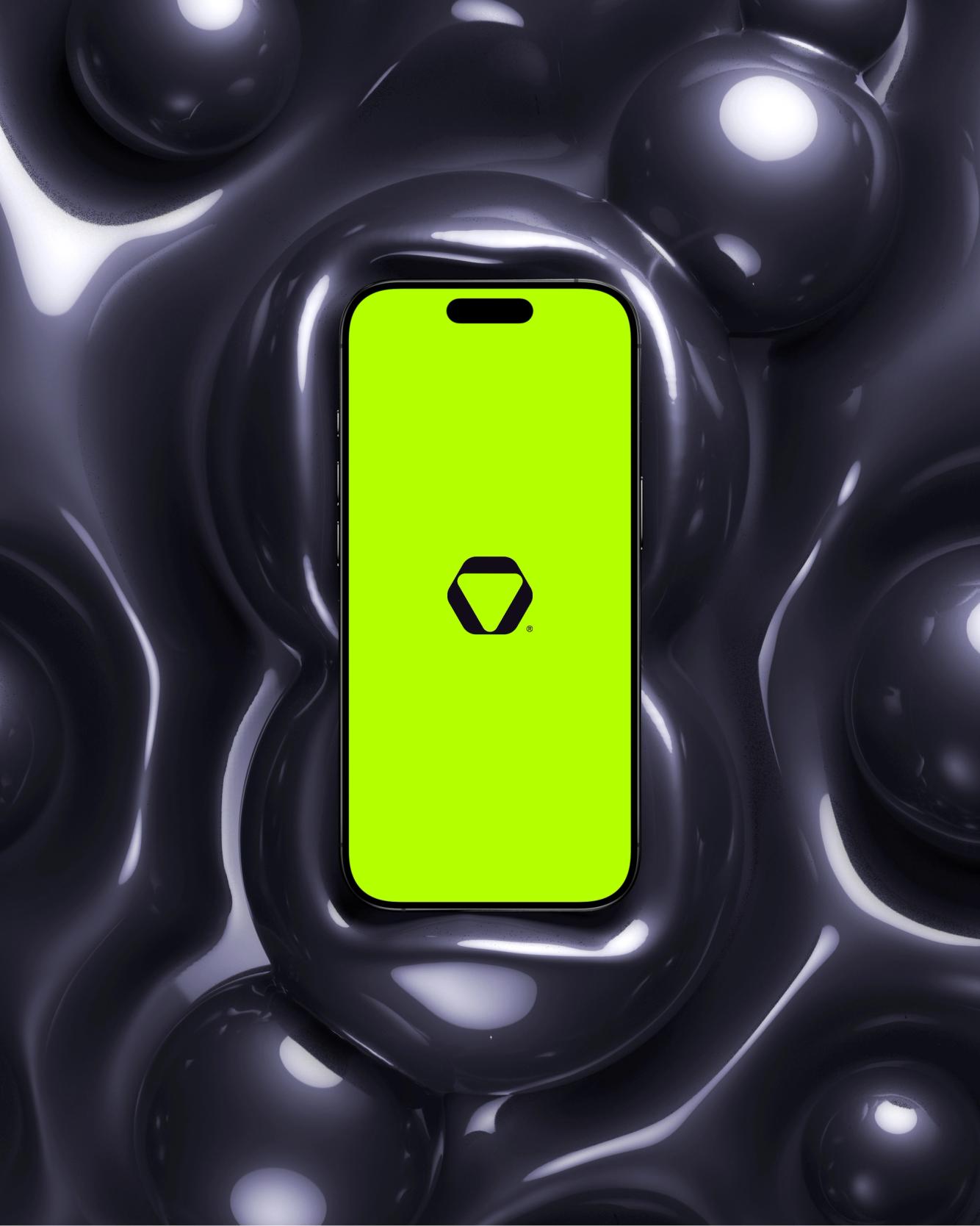 Neon green mobile app screen with hexagon logo displayed on smartphone over glossy black 3D surface, showcasing modern tech branding