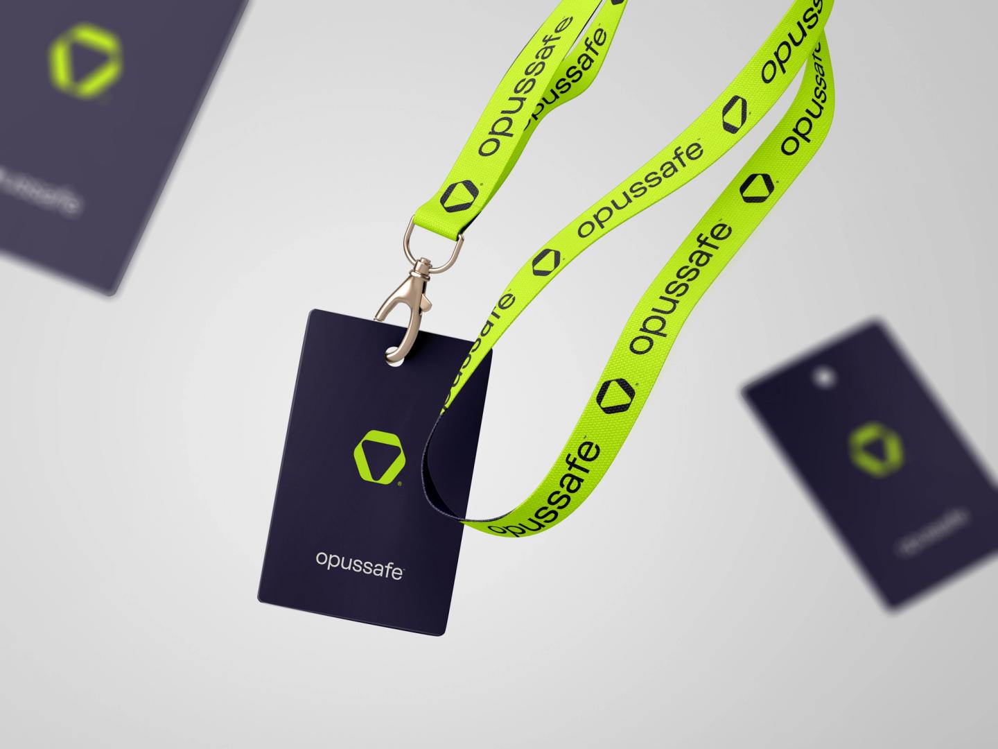 Opussafe branded ID badge with a vibrant yellow lanyard, showcasing modern branding design and security services.