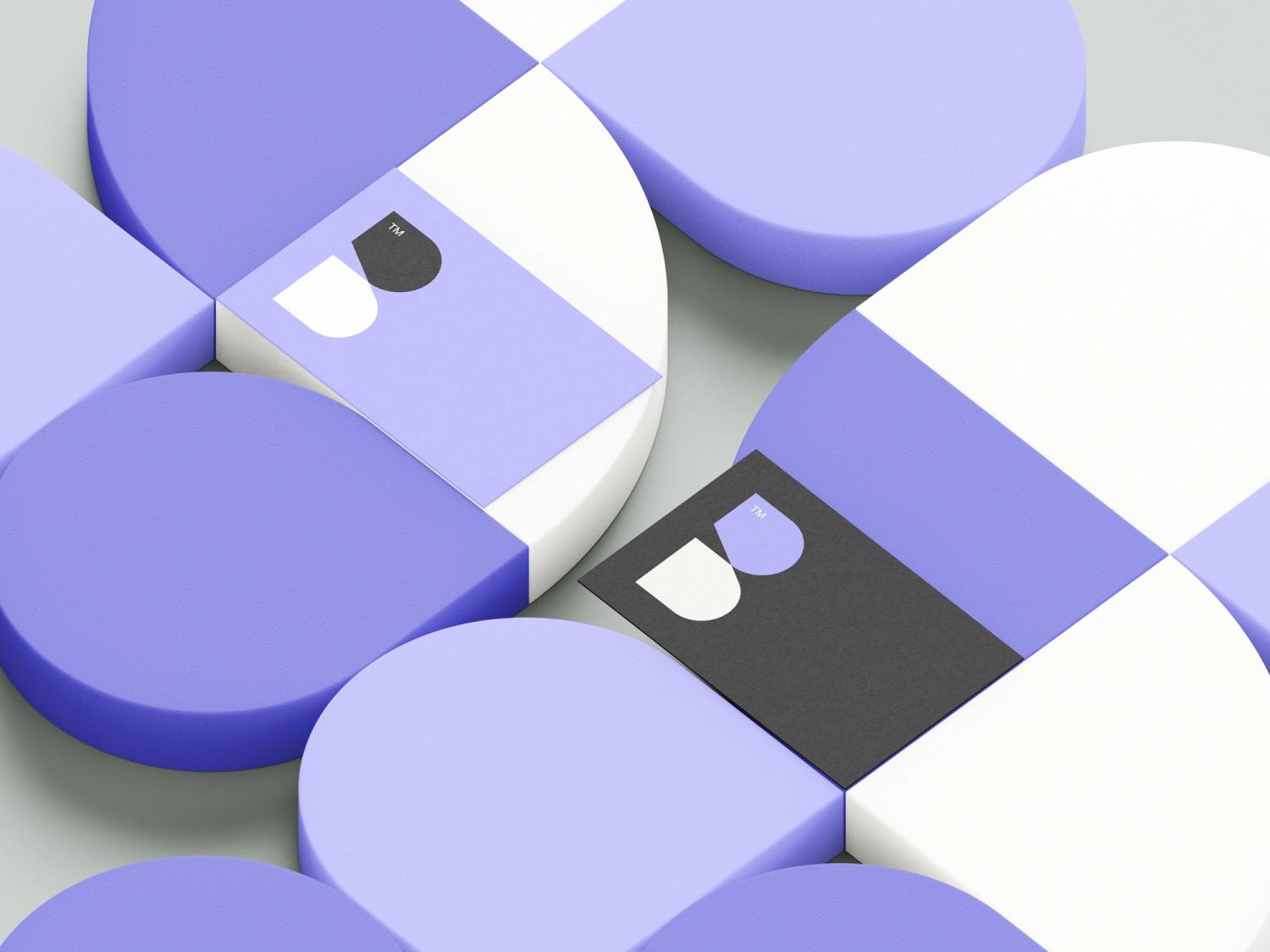 Creative branding design with purple and white geometric shapes and a modern business card featuring a minimalist 'B' logo.