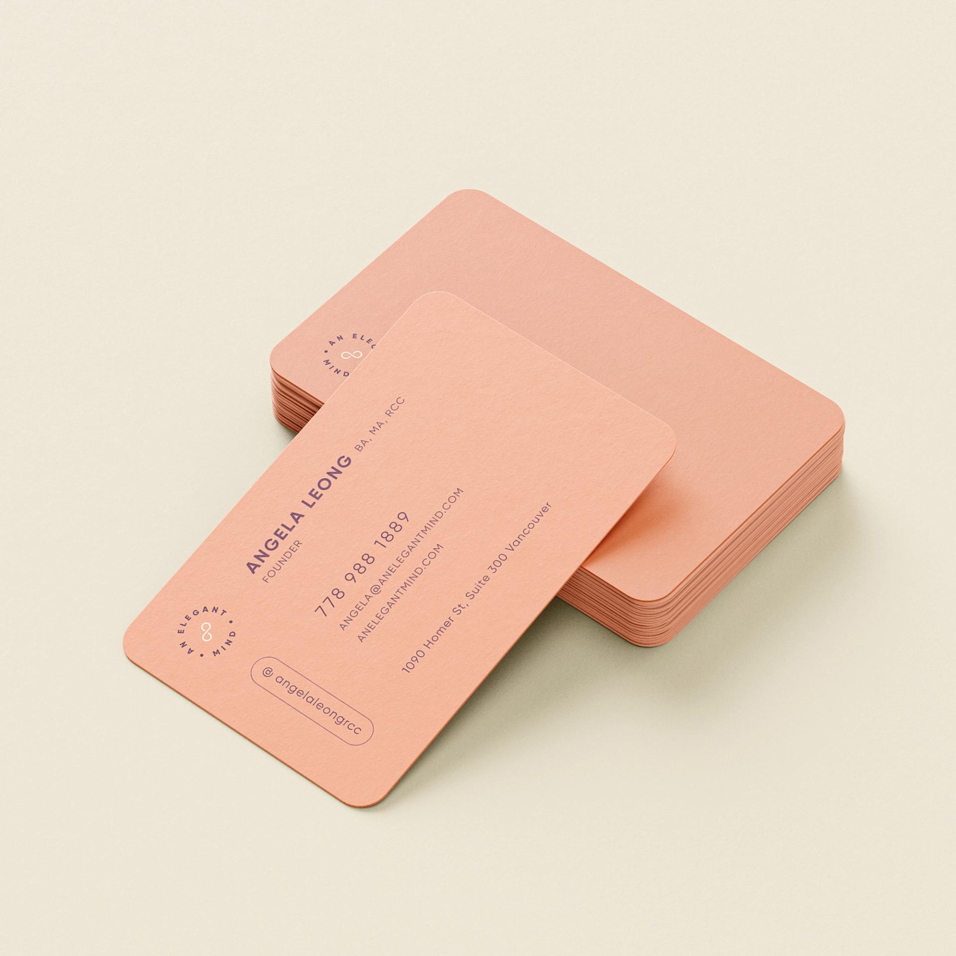 Peach business cards with rounded corners and minimalist typography for Angela Leong.