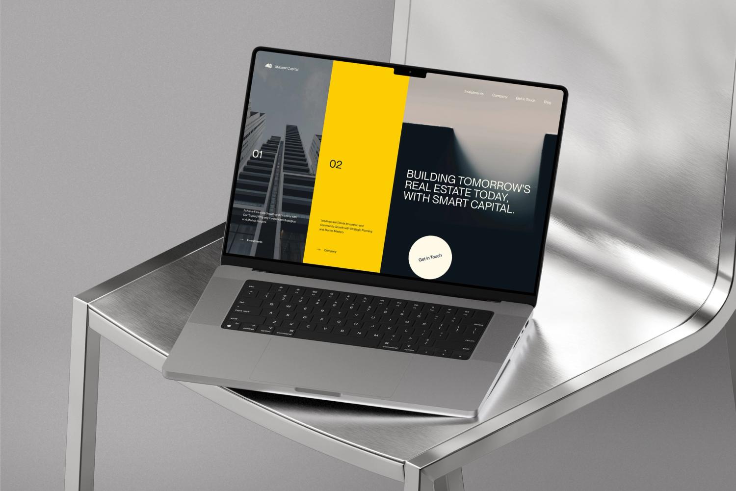 Laptop displaying a modern real estate website with a sleek design, showcasing smart capital and building tomorrow’s real estate.
