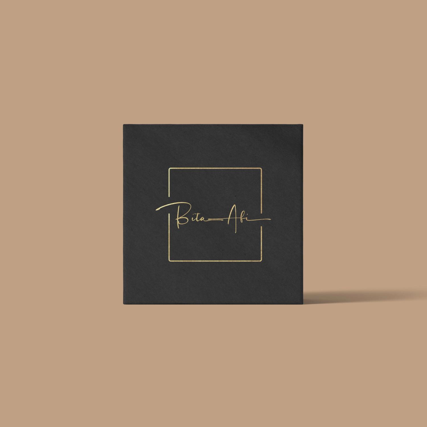 Elegant black square card featuring "Bita Afi" logo in gold cursive within a simple square frame.