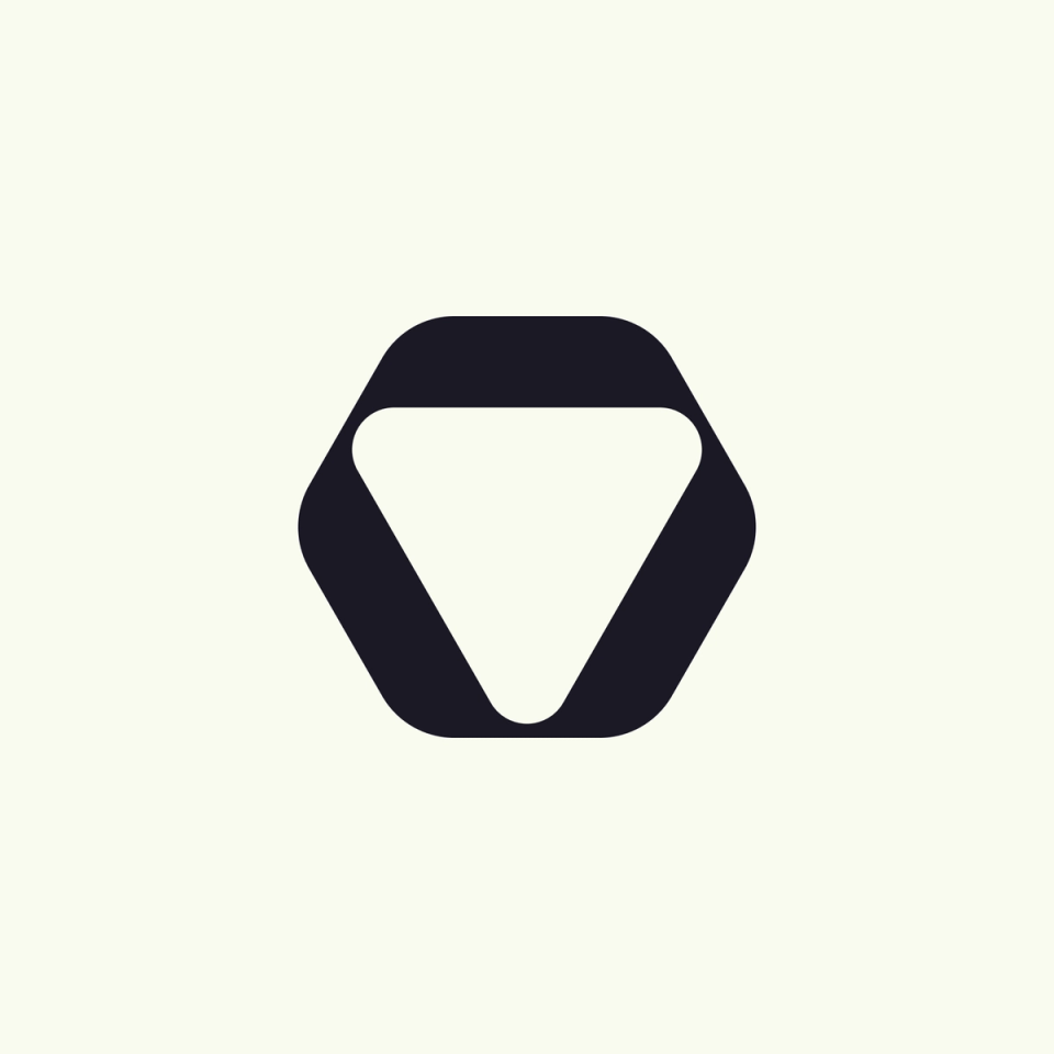 Minimalist black hexagonal logo with an inverted triangle, showcasing modern design and branding aesthetics.