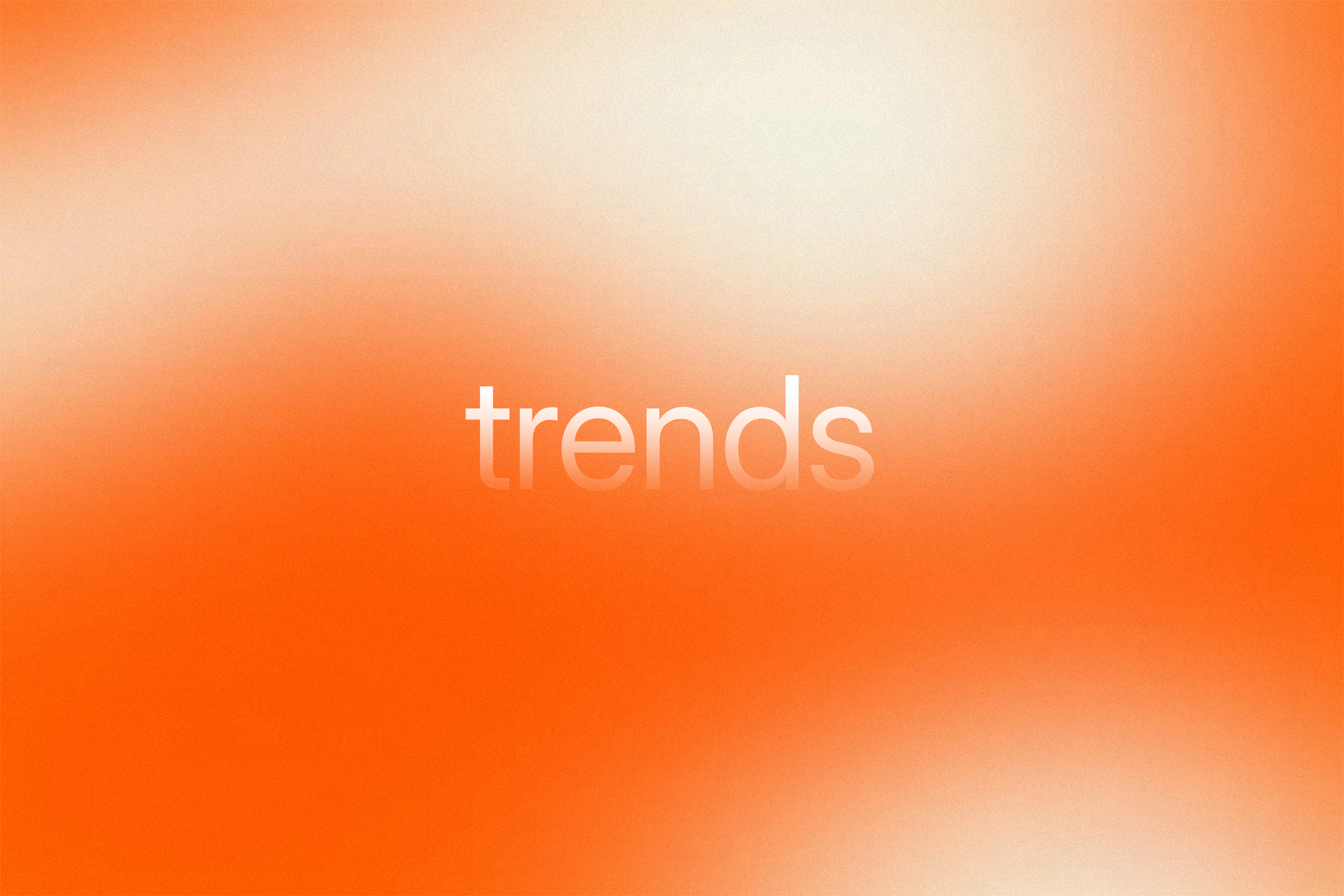 Orange gradient background with “trends” text representing 2025 app development trends