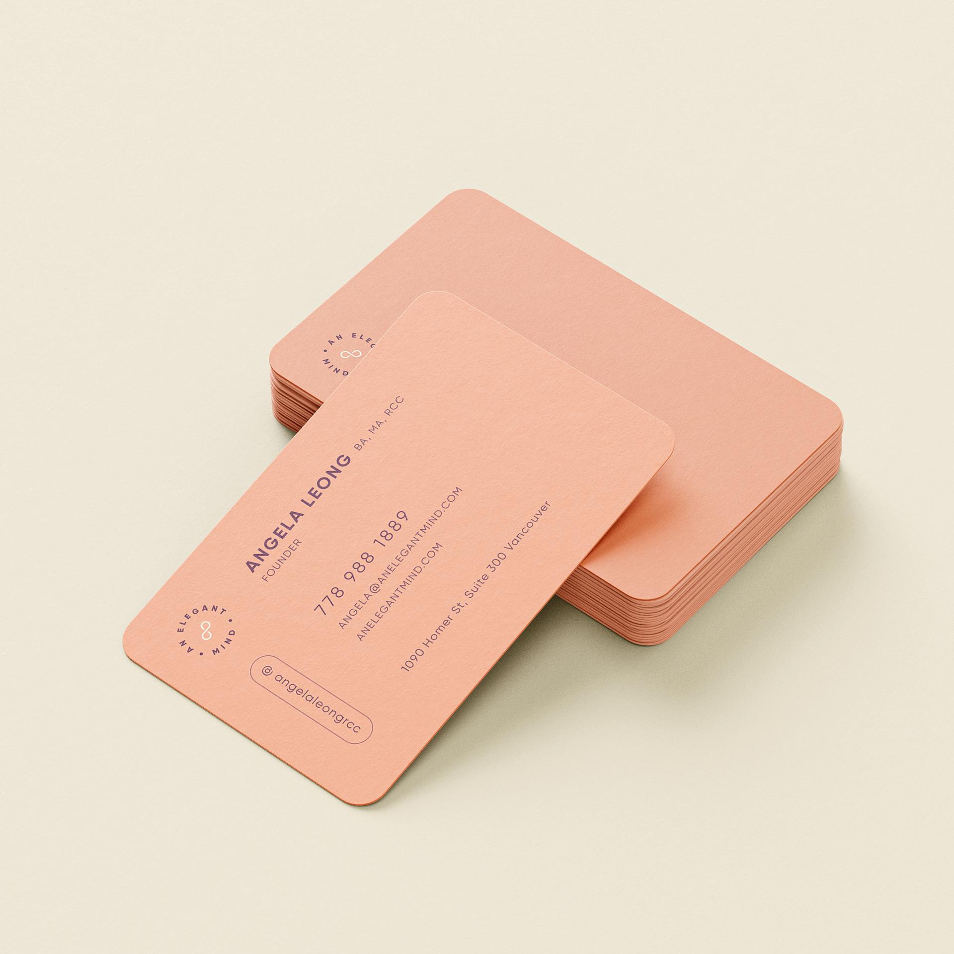 Peach business cards with rounded corners and minimalist typography for Angela Leong.