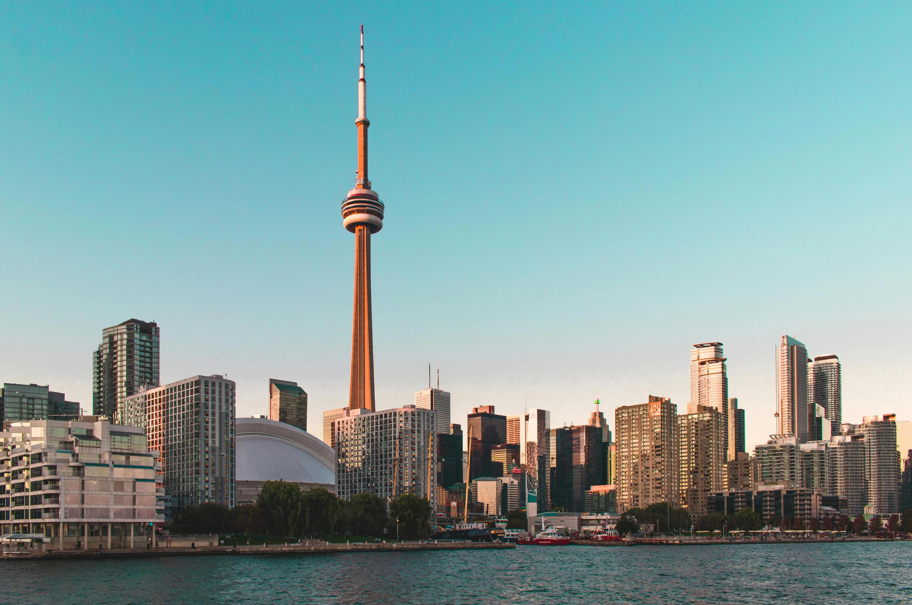 View of Toronto's CN Tower in front of a blue sky