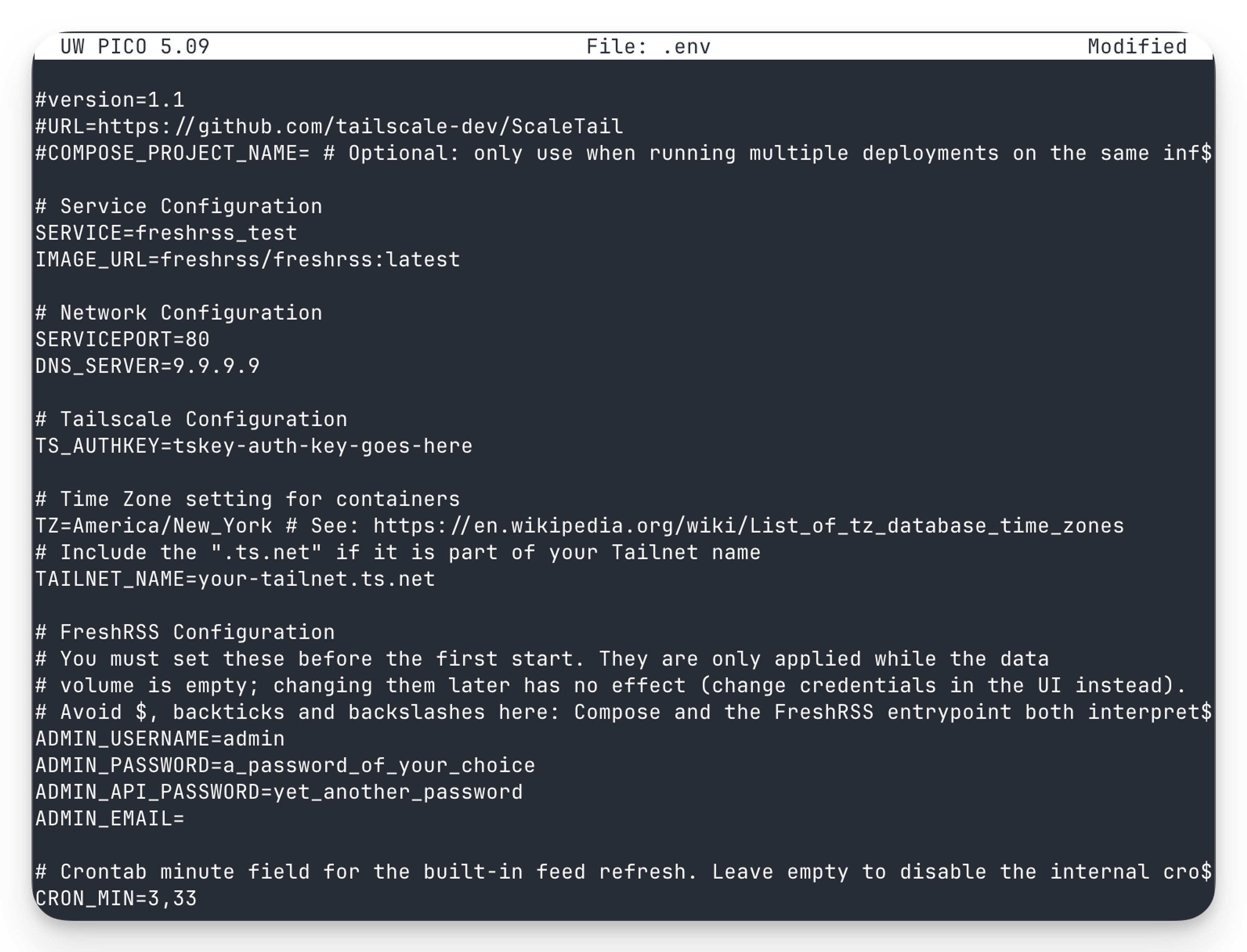 Environment configuration file (.env) for UW PICO 5.09 displaying FreshRSS service setup with network, Tailscale, timezone, and admin credential settings in dark terminal interface.
