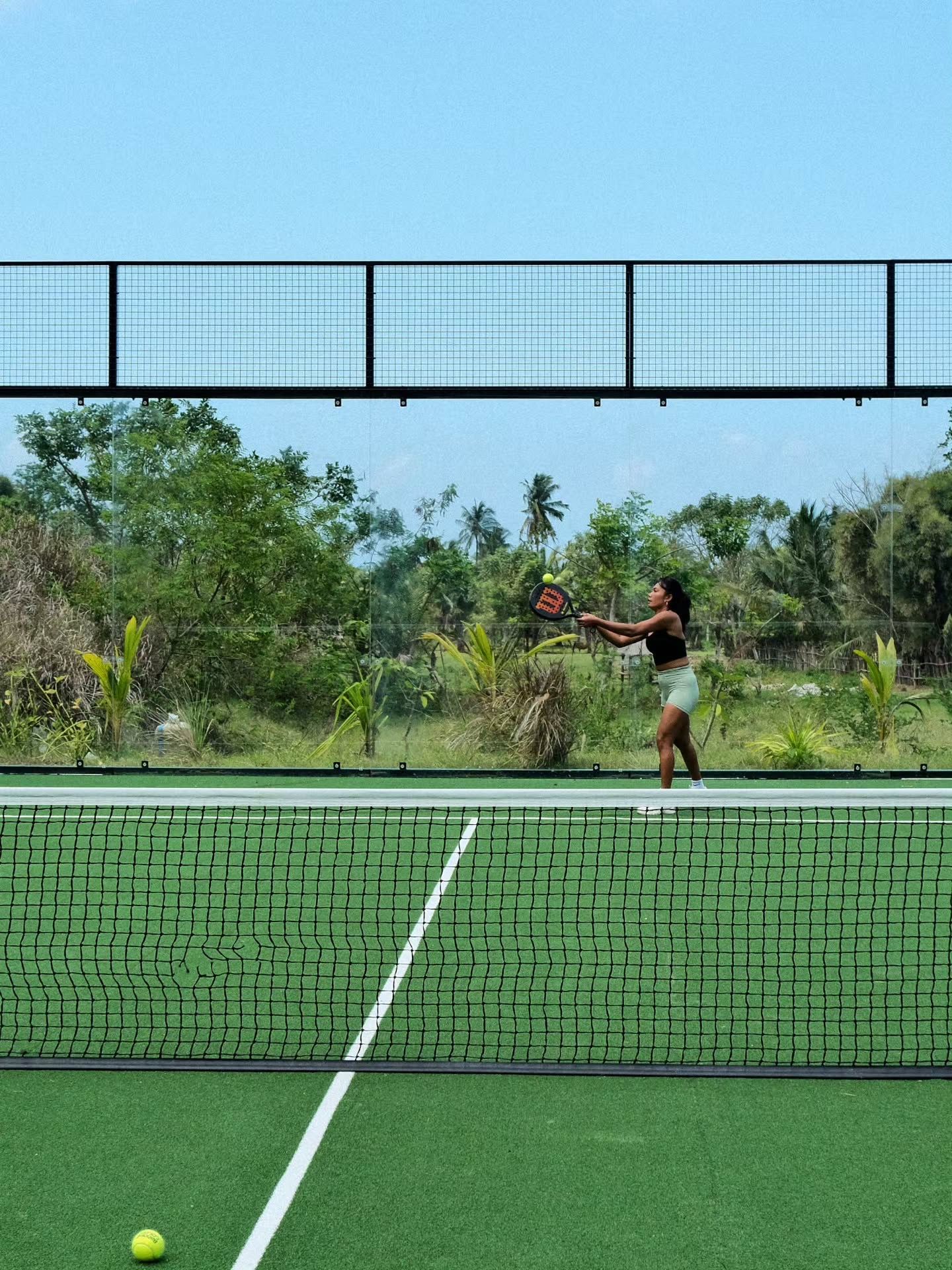 Padel player on the outdoor court at SABA Lombok