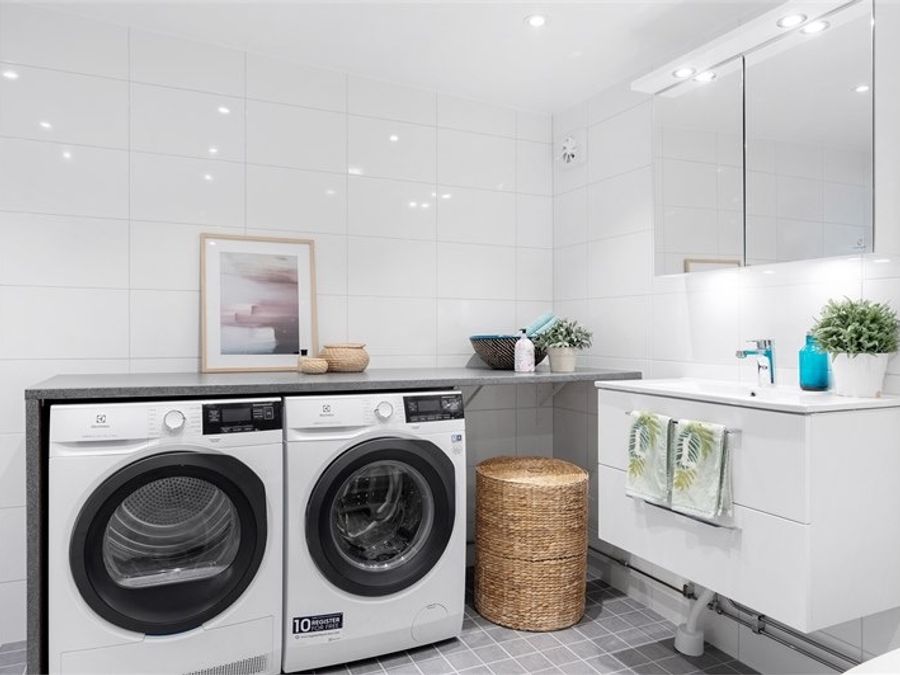 Tvättstuga med Electrolux-tvättmaskiner