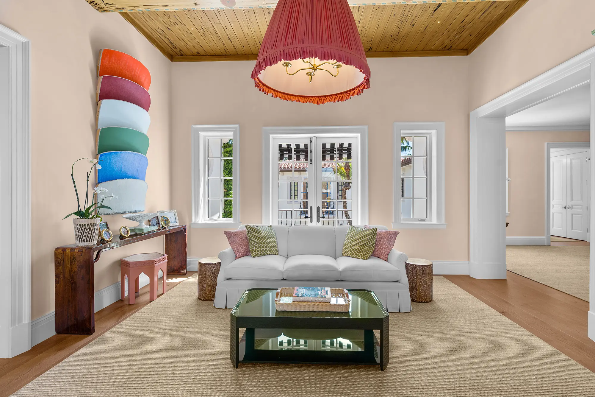 Luxury sitting room with custom furnishings and statement lighting.