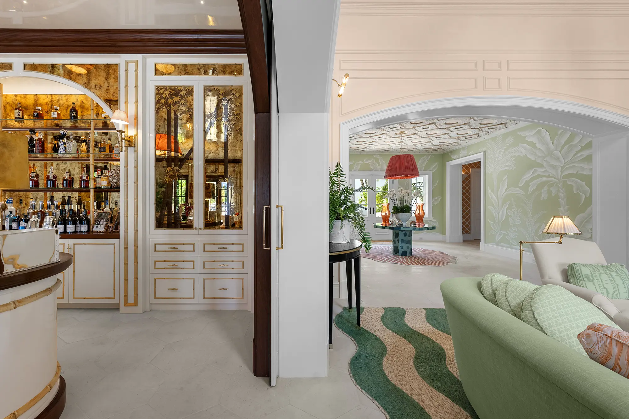 Luxury interior with custom bar, millwork and botanical details.
