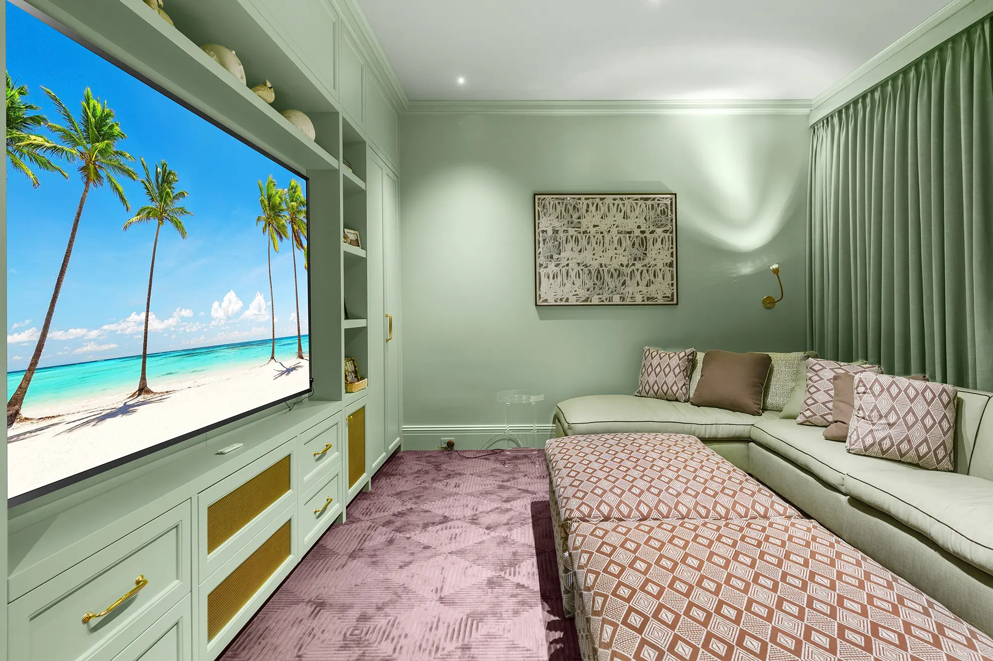 Luxury media room with custom built-ins and layered textiles.