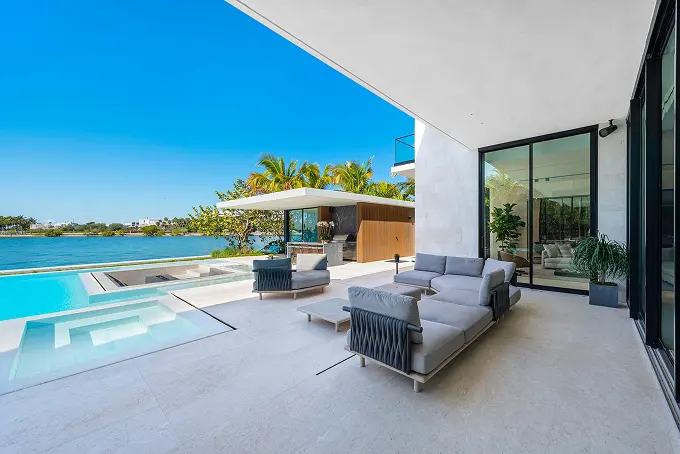 Back patio view overlooking the pool and the bay beyond.