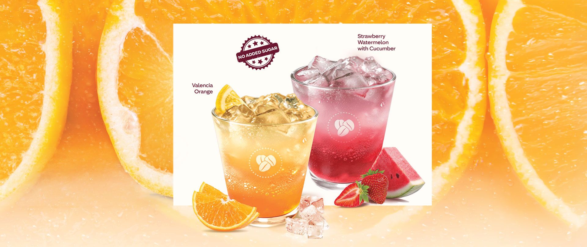 Two iced refreshers with Valencia Orange and Strawberry Watermelon & Cucumber flavours, served with fruit and ice.