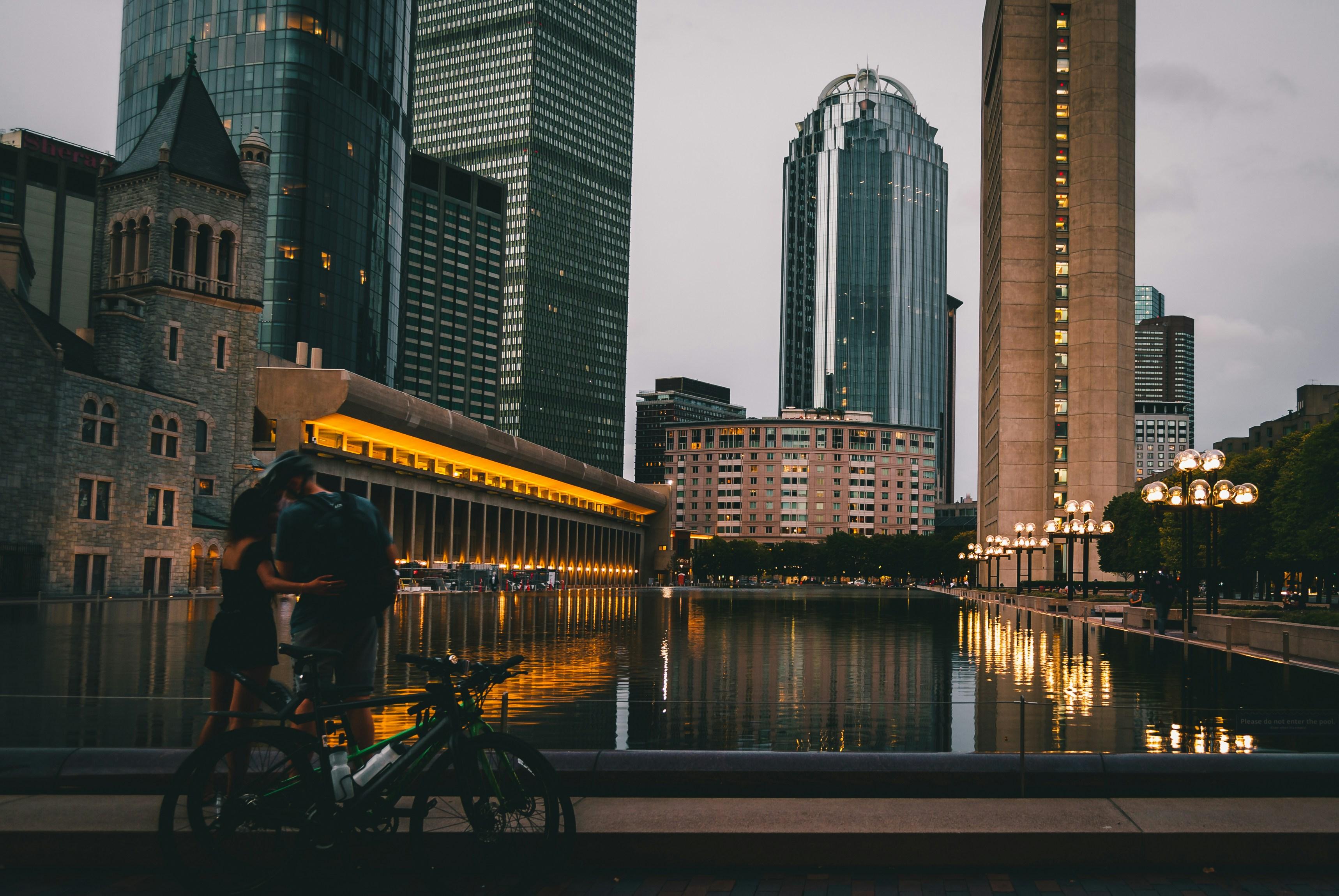 The Christian Science Plaza reflecting pool at dusk, with Back Bay towers behind it