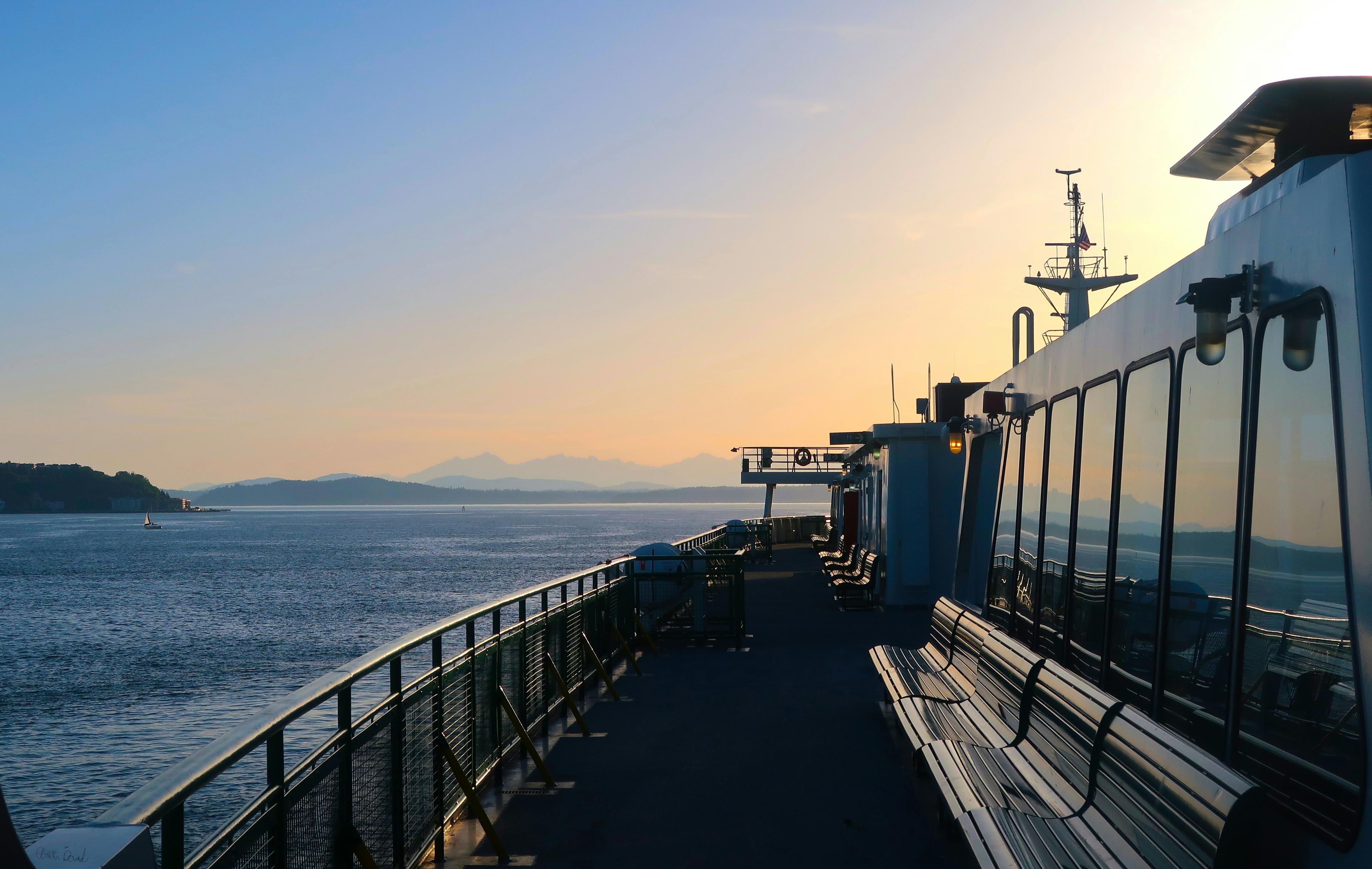 The deck of a Washington State ferry on Puget Sound at sunset