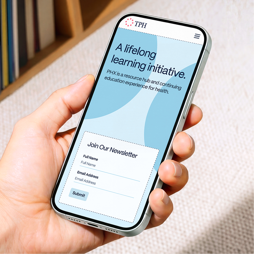 A hand holding a phone showing the TPH site and its lifelong learning initiative