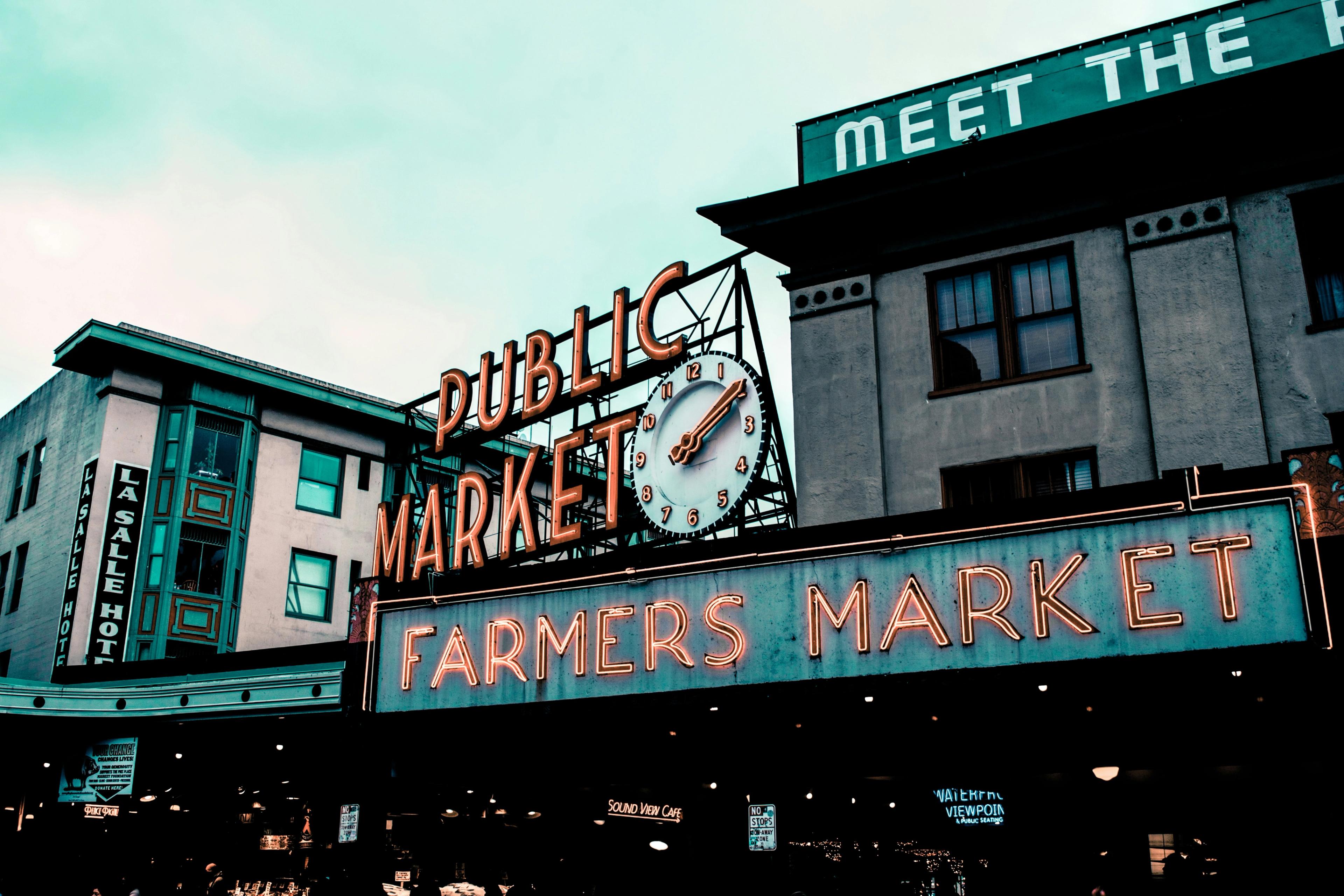 The Public Market sign and clock at Pike Place Market in Seattle