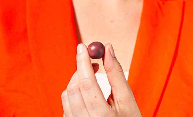 Woman holding a Foodberry