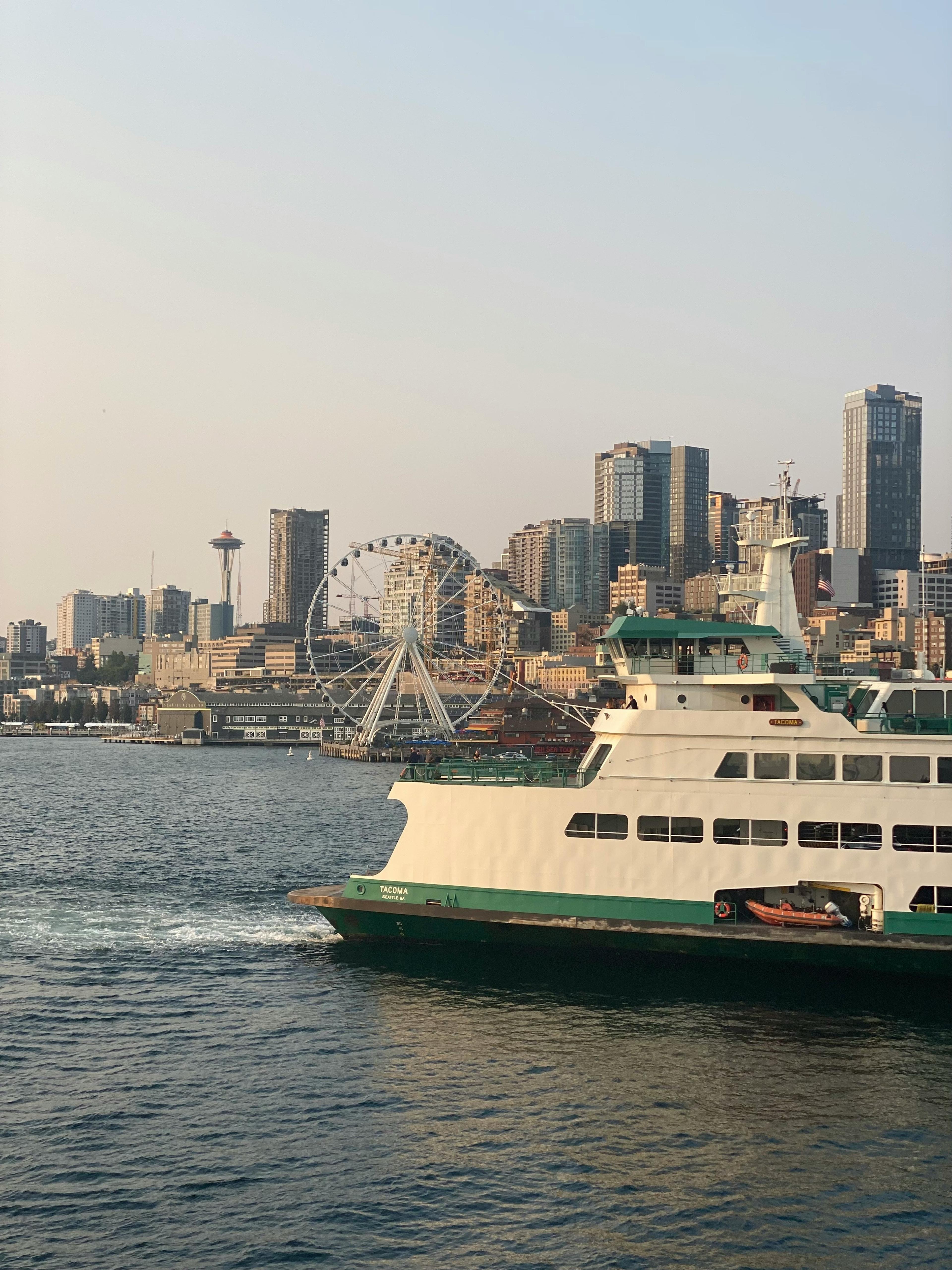 Washington state ferry with Seattle cityscape in the background
