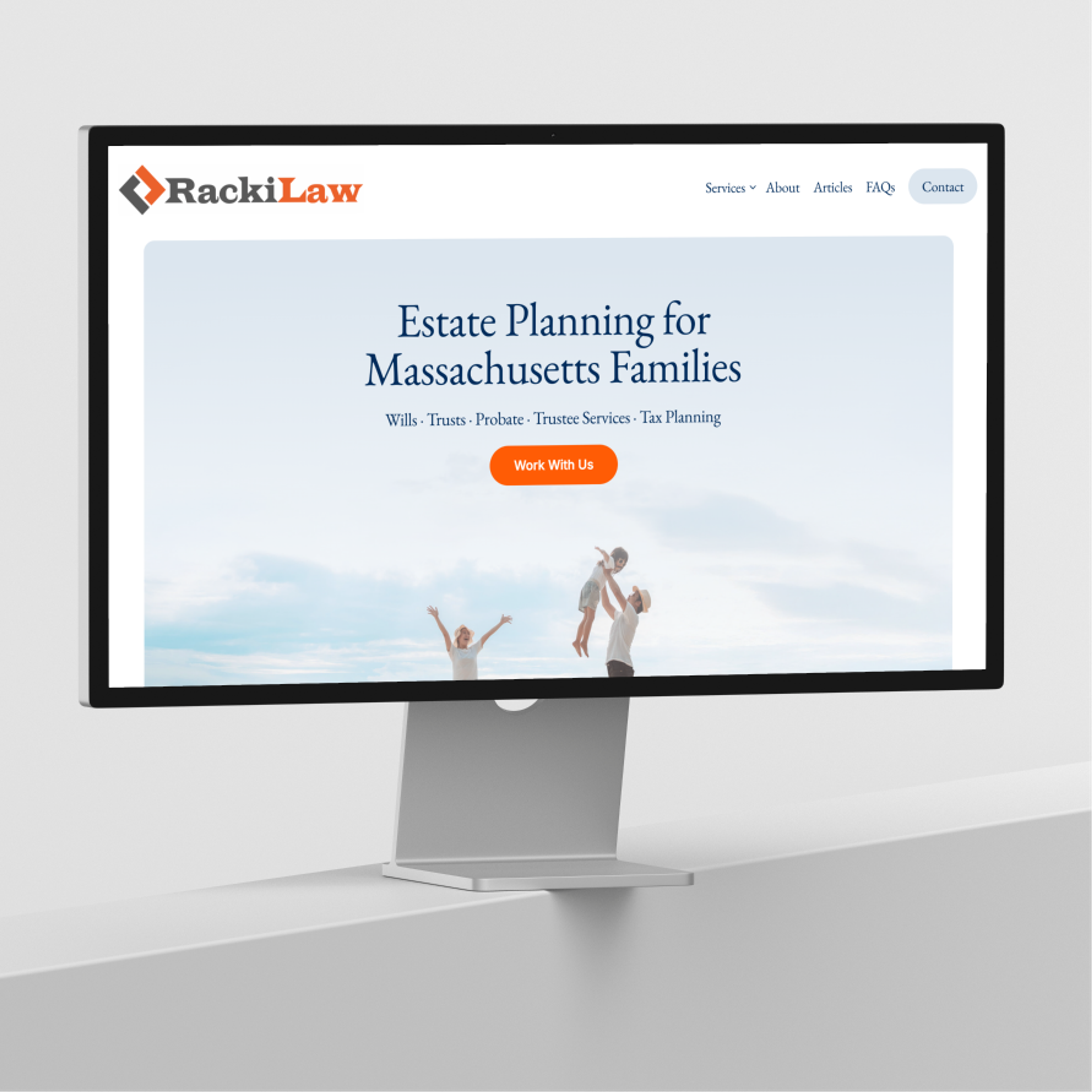 The Racki Law estate planning site on a desktop monitor