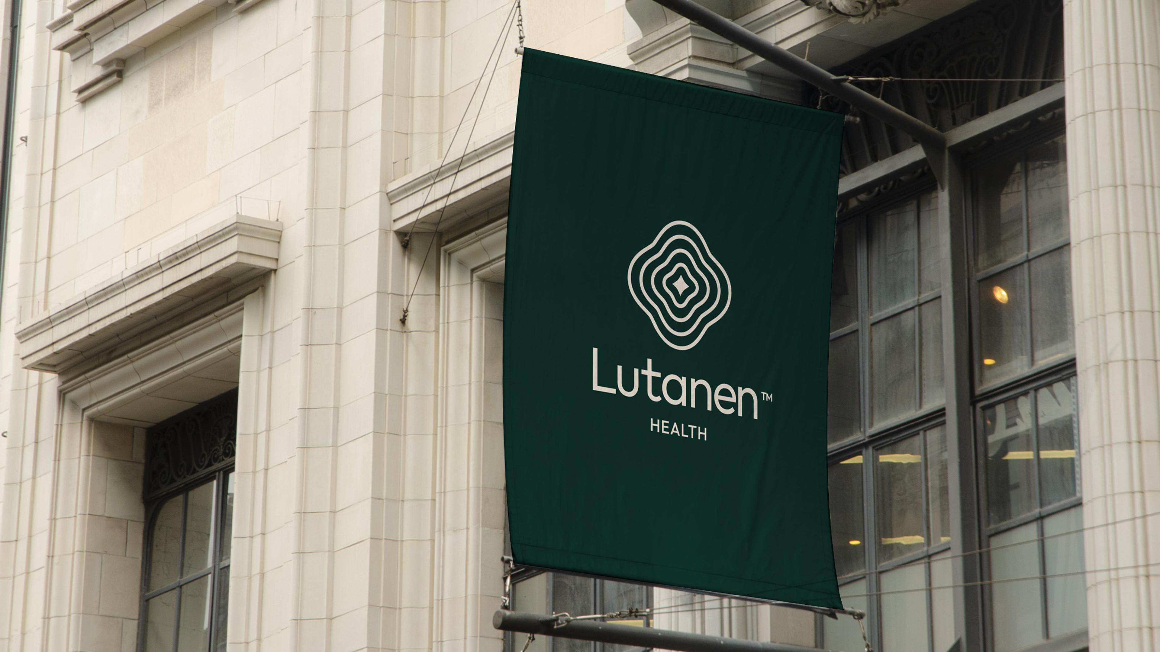 Lutanen banner hanging on the side of a building