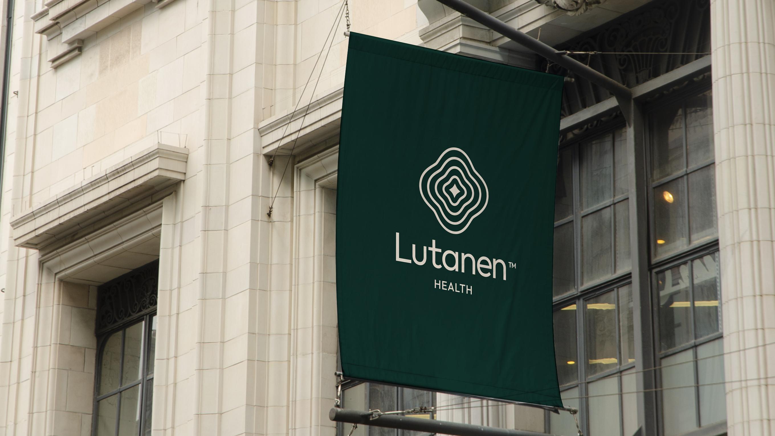 Lutanen banner hanging on the side of a building