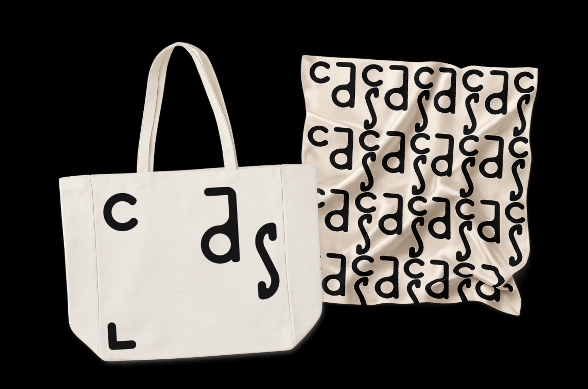Cream CAS tote bag beside a matching patterned scarf