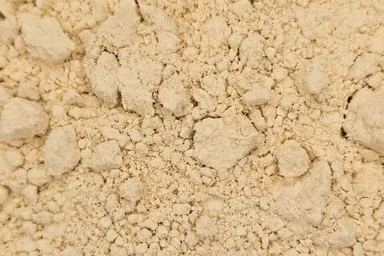 A close-up of De-oiled Blend (60/40) Mustard Flour, highlighting its uniform texture and balanced color.