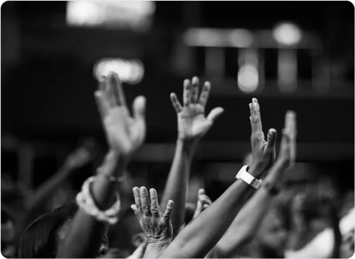 Open scriptures held in worship