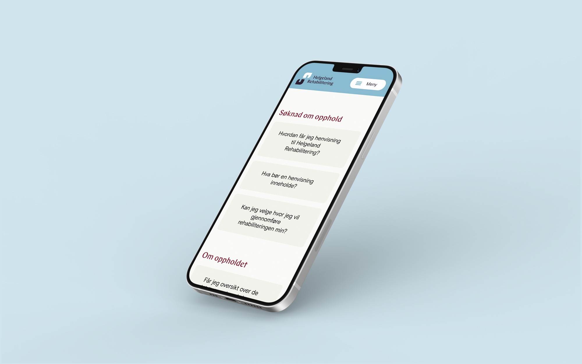 Nettsiden til Helgeland Rehabilitering på mobil. Foto.