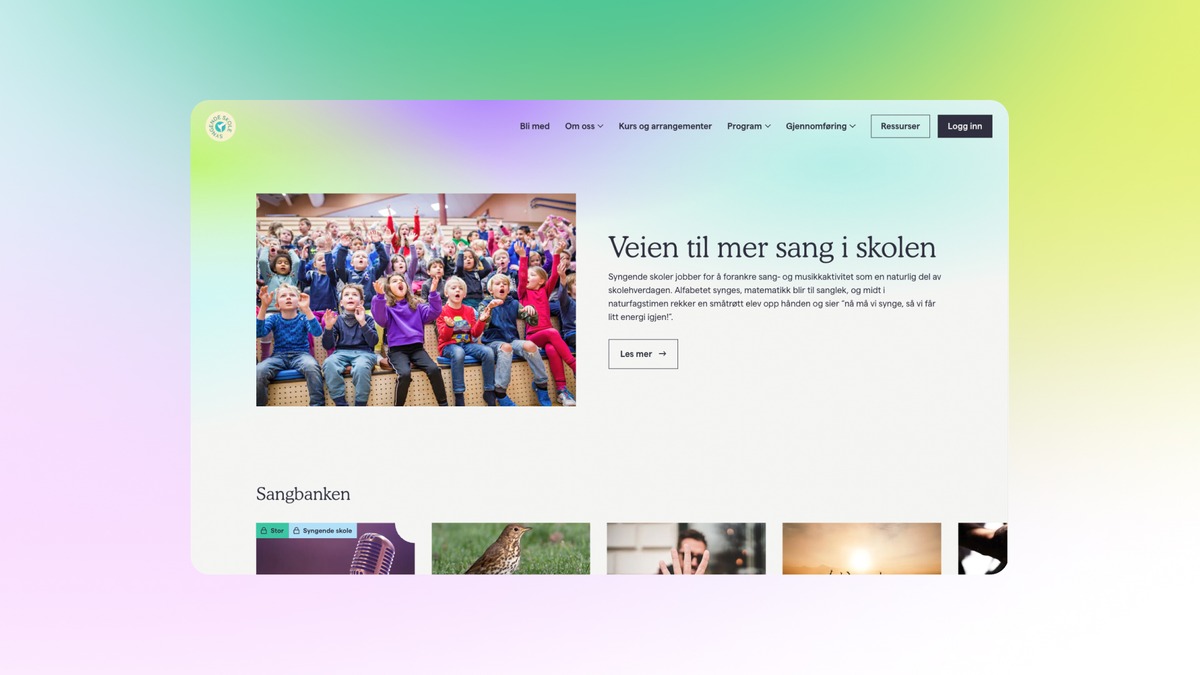 a website with a picture of a group of children sitting on a bench .