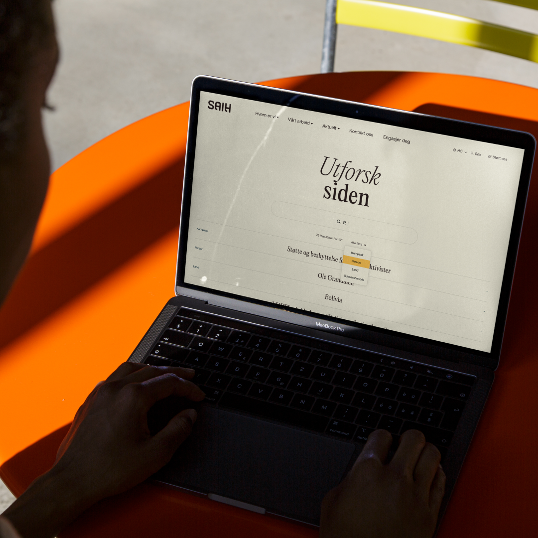 En mac med siden "Utforsk siden"