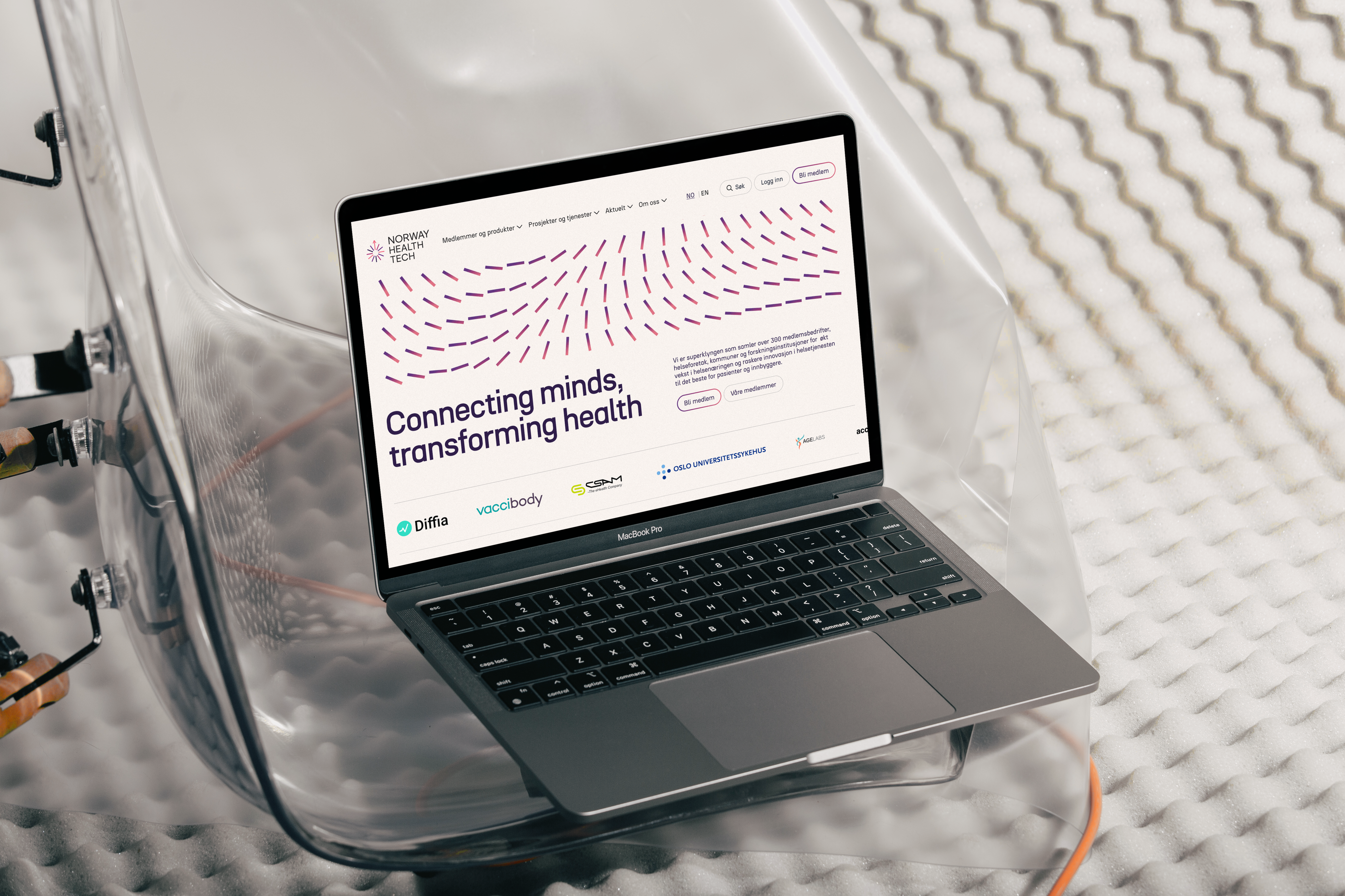 a laptop with the words connecting minds transforming health on the screen