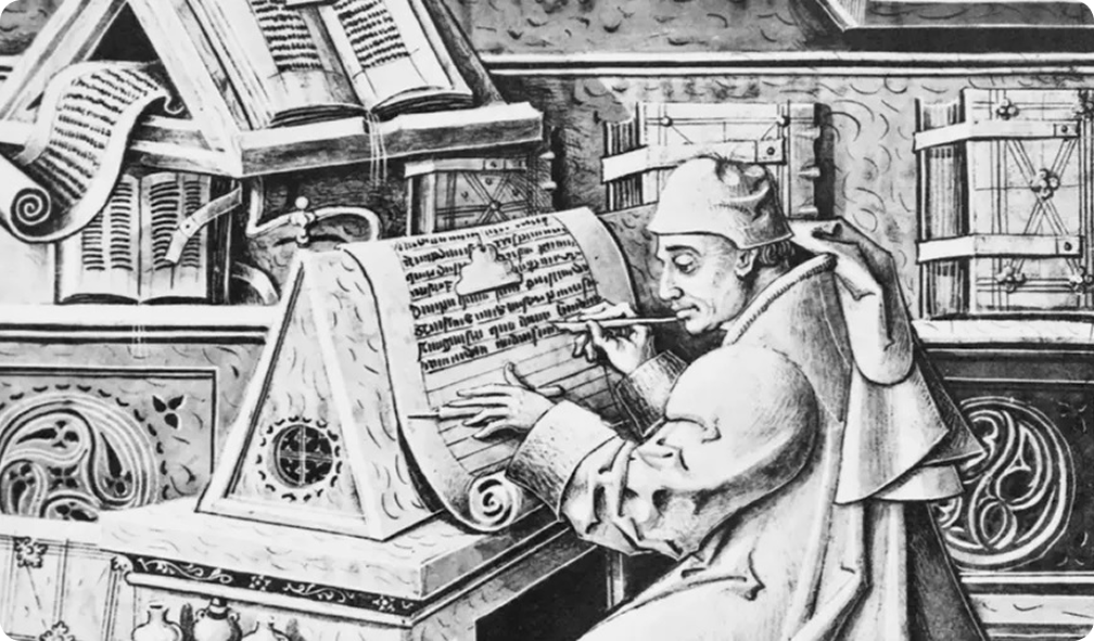 En munk som skriver tekst manuelt på en 