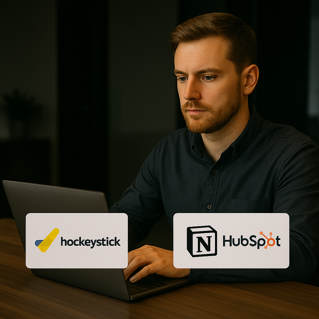 a man sitting in front of a laptop computer