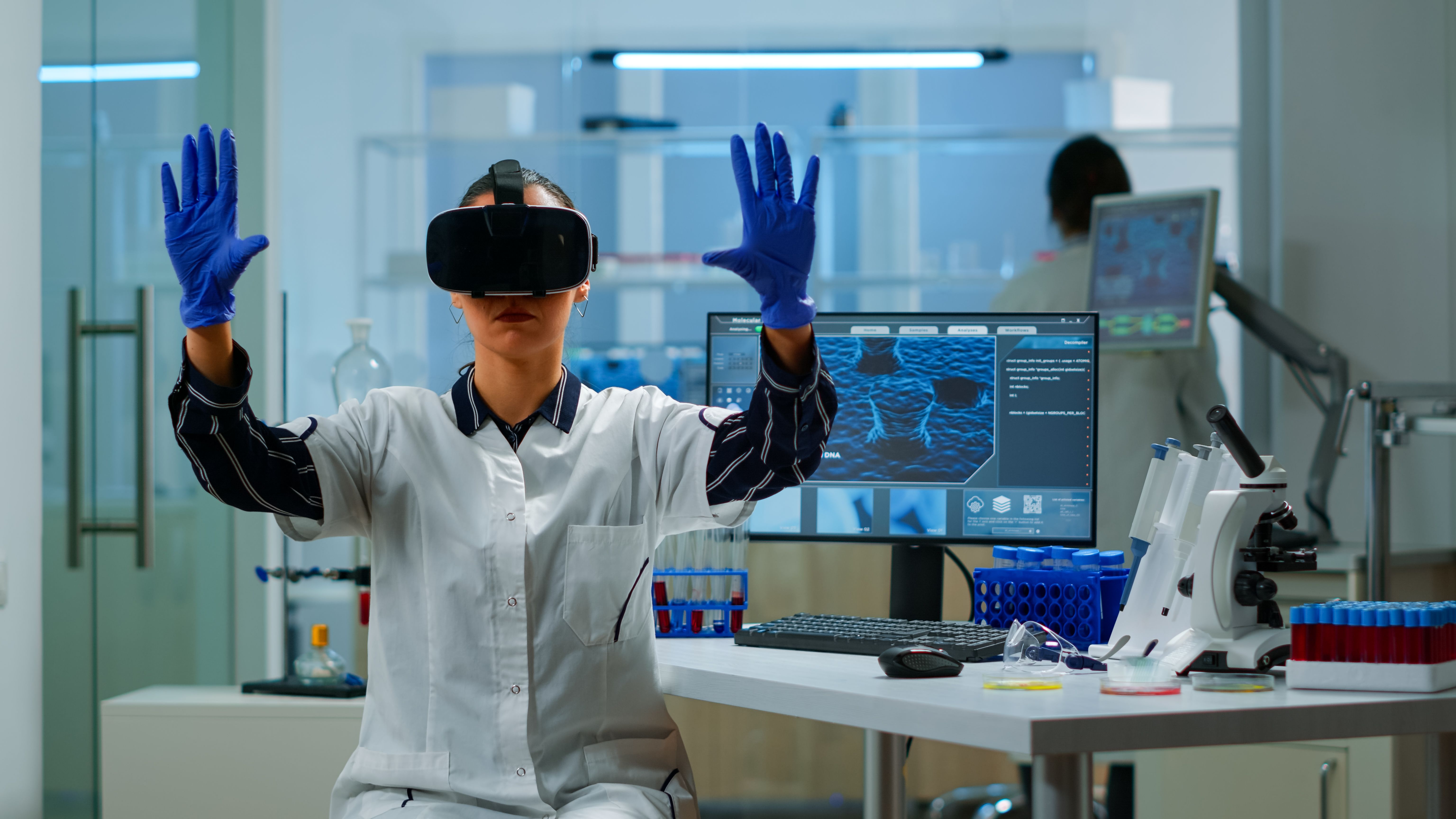 a man in a lab wearing a virtual headset