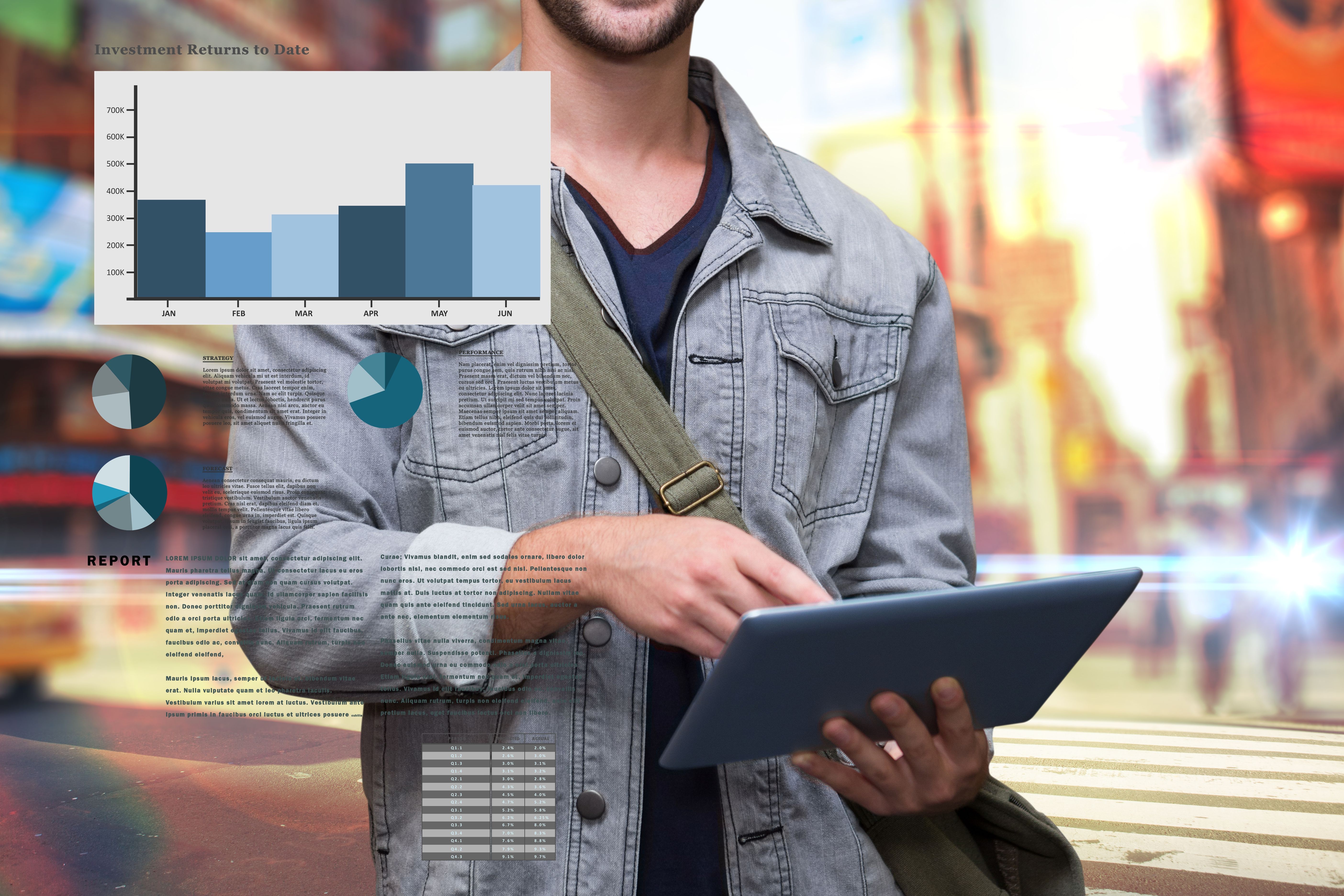a man holding a tablet in his hands