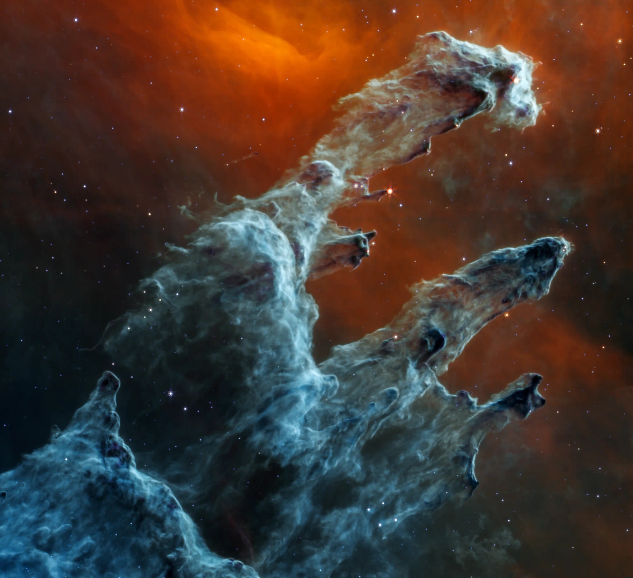 Mid-infrared view of the Pillars of Creation captured by the James Webb Space Telescope. Image credit: NASA
