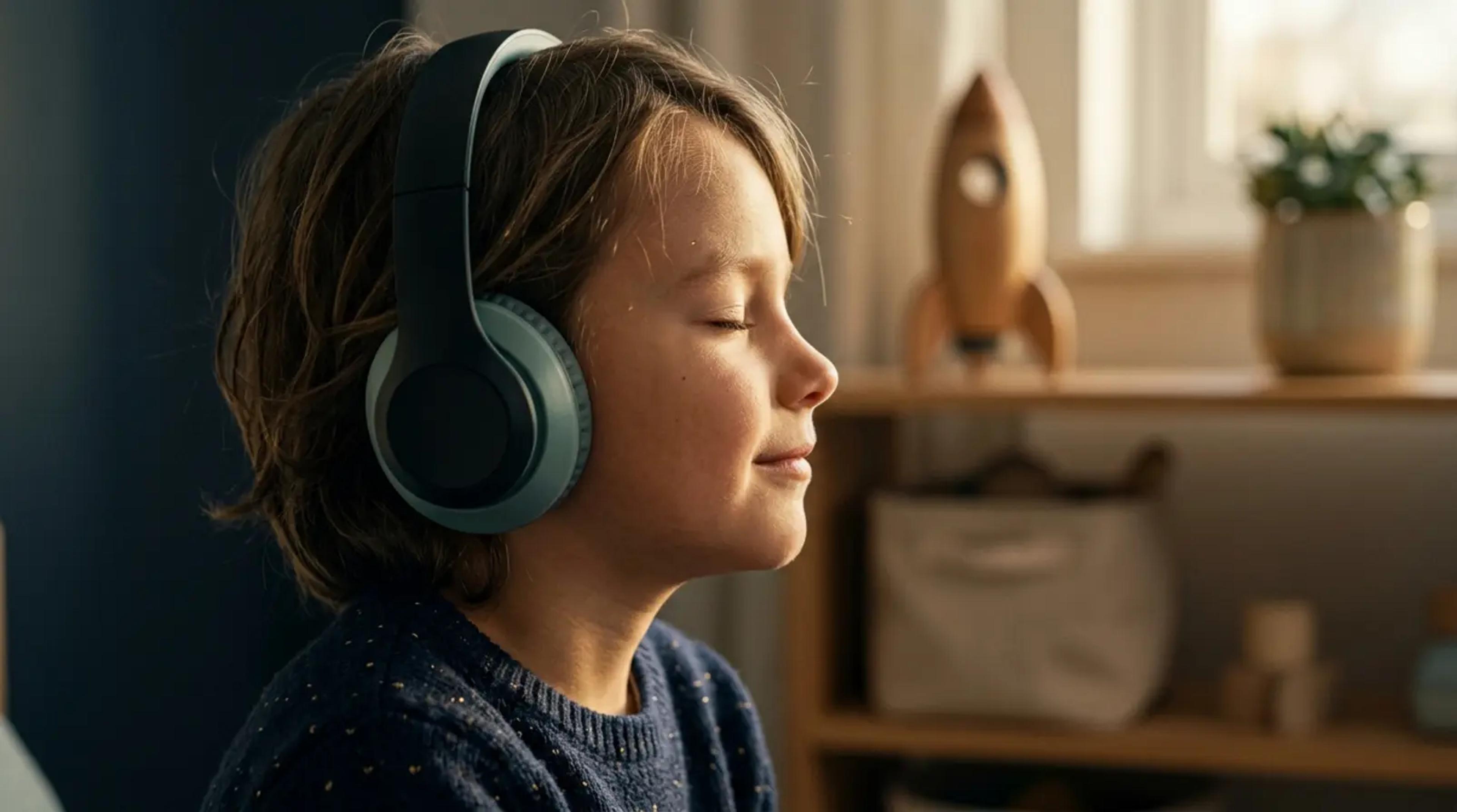 A young child sitting peacefully with eyes closed wearing headphones, imagining a vibrant world of adventure.