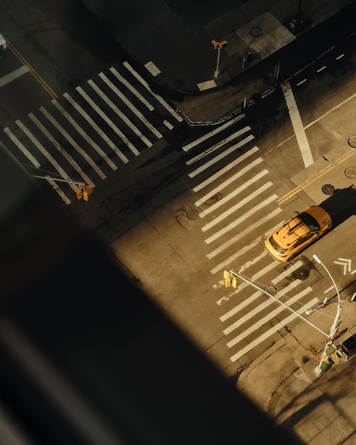 A yellow cab caught on camera in the midst of New York traffic.