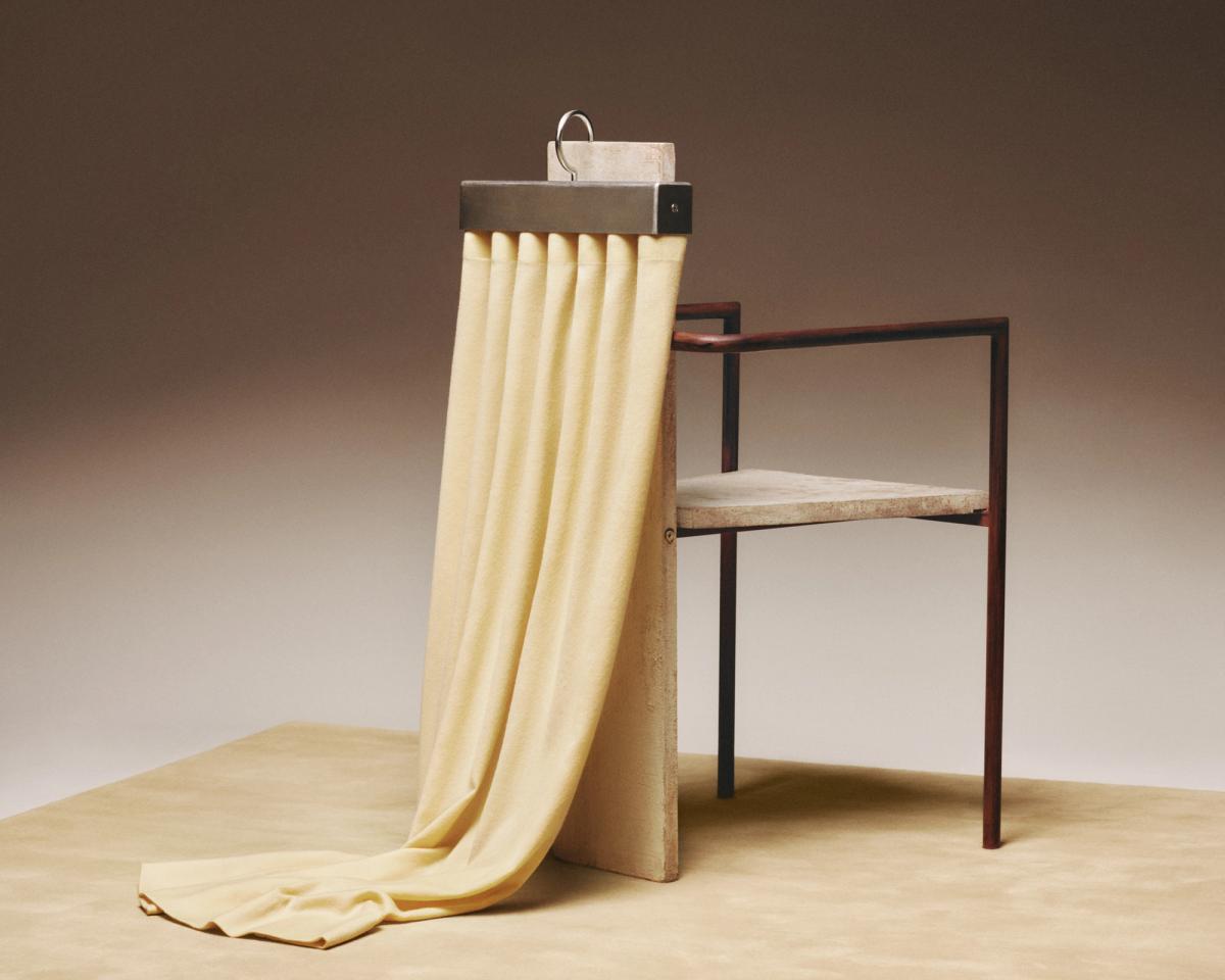 The Grand wool curtain in Sunrise paired with the Grand rug in Butter.