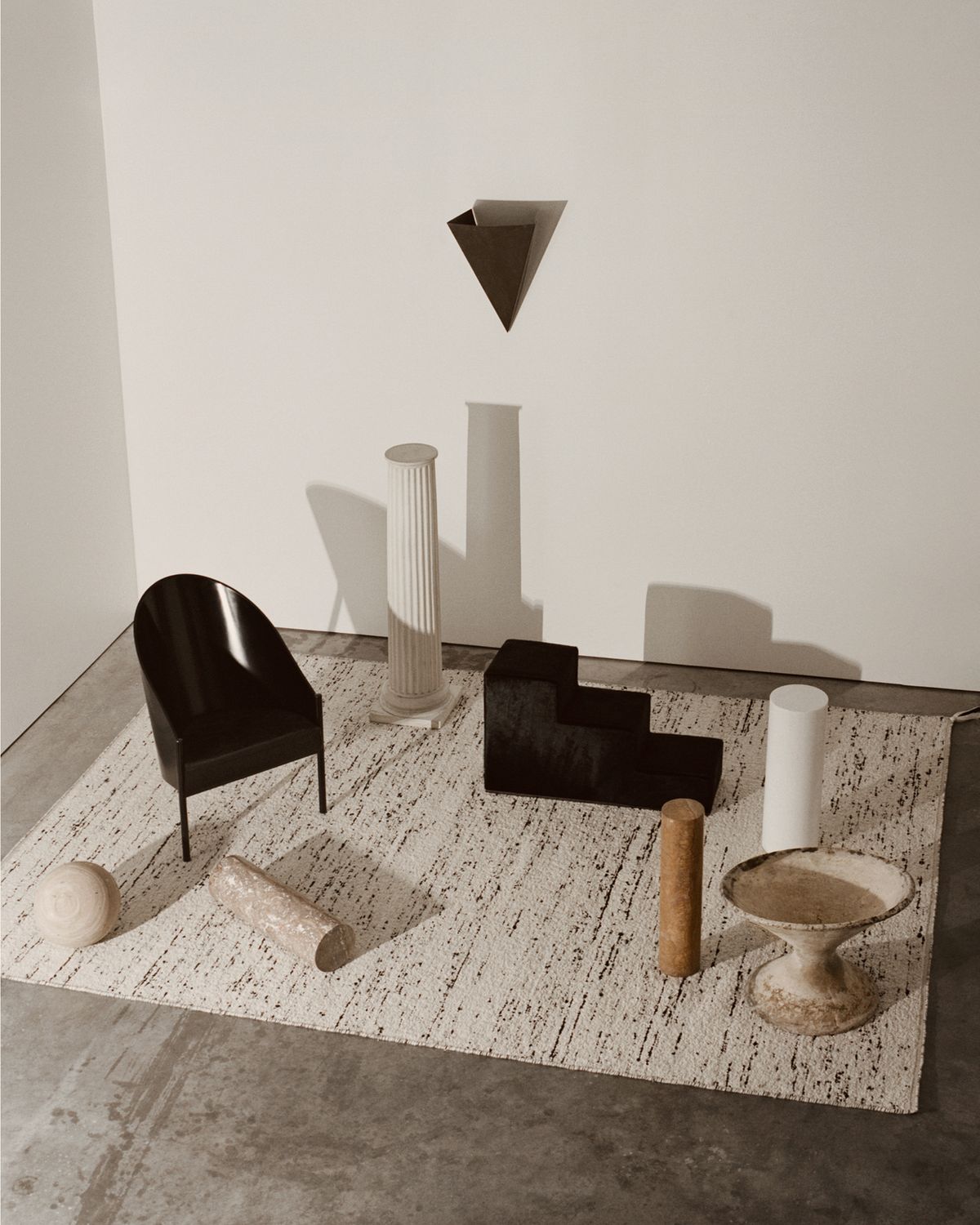 Bouclé in black and white shot from above displayed with black and white interior details