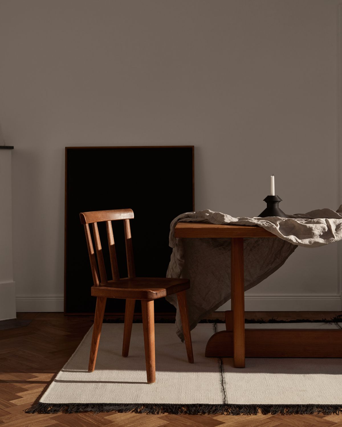 Stitches in Old White, a Hand woven flat weave design in a dining room.