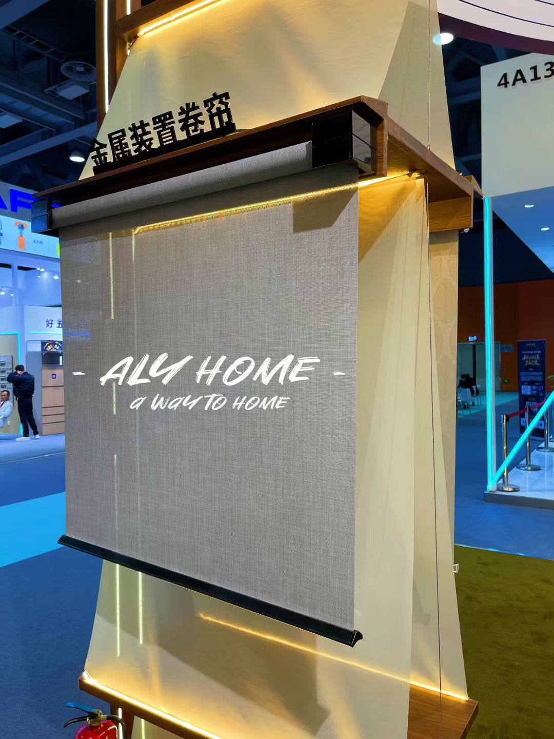 Side view of motorised roller blind with motorised drive system at ALY HOME booth