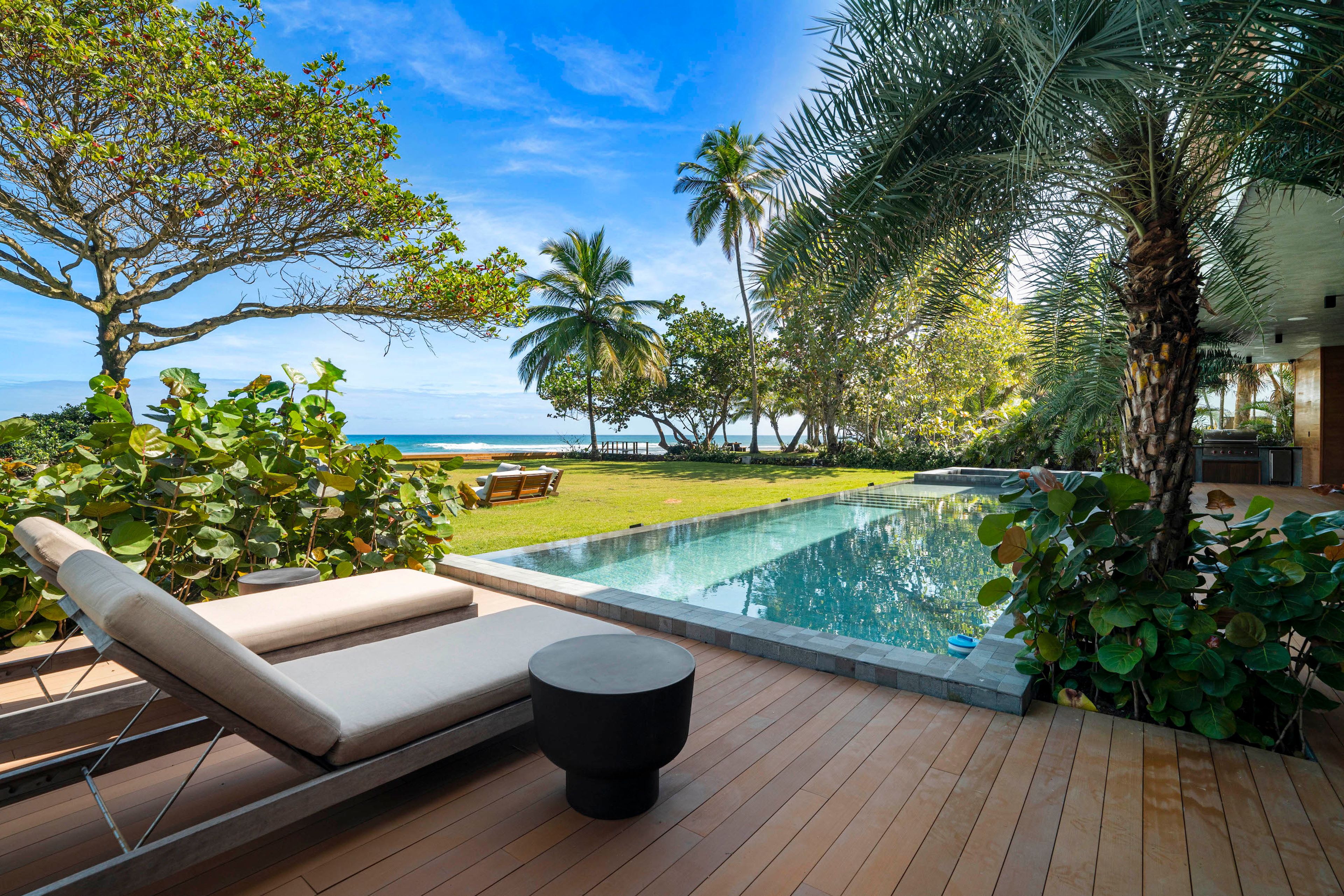 Pool terrace overlooking Playa Encuentro at Villa Roge